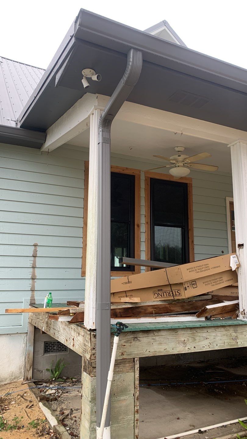 Seamless Gutter Installation using Charcoal Grey Gutters by Gutter Professors