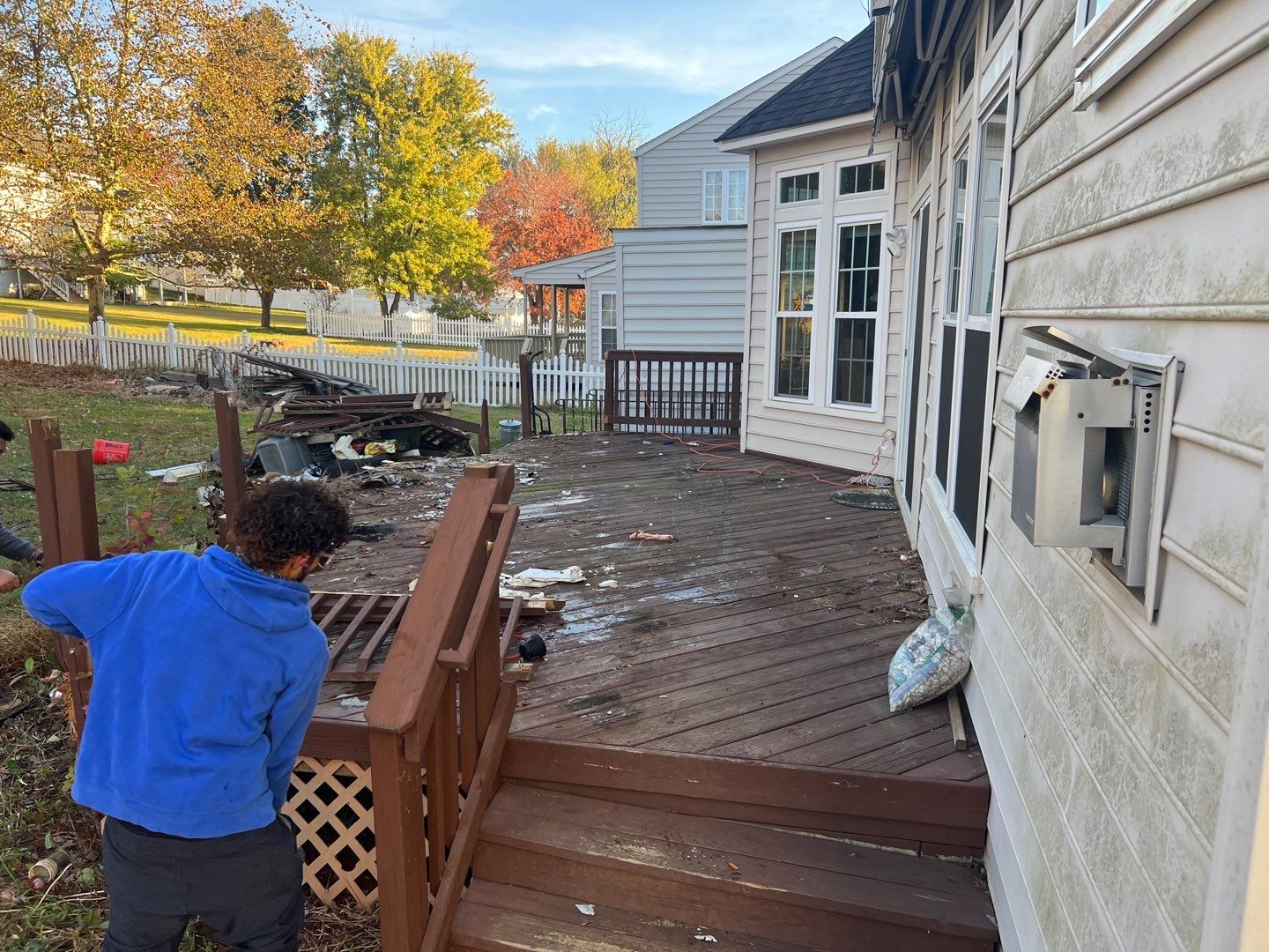 Custom Screened-In Porch with Stamped Concrete Patio in Warrenton by Jakari Restoration & Construction LLC