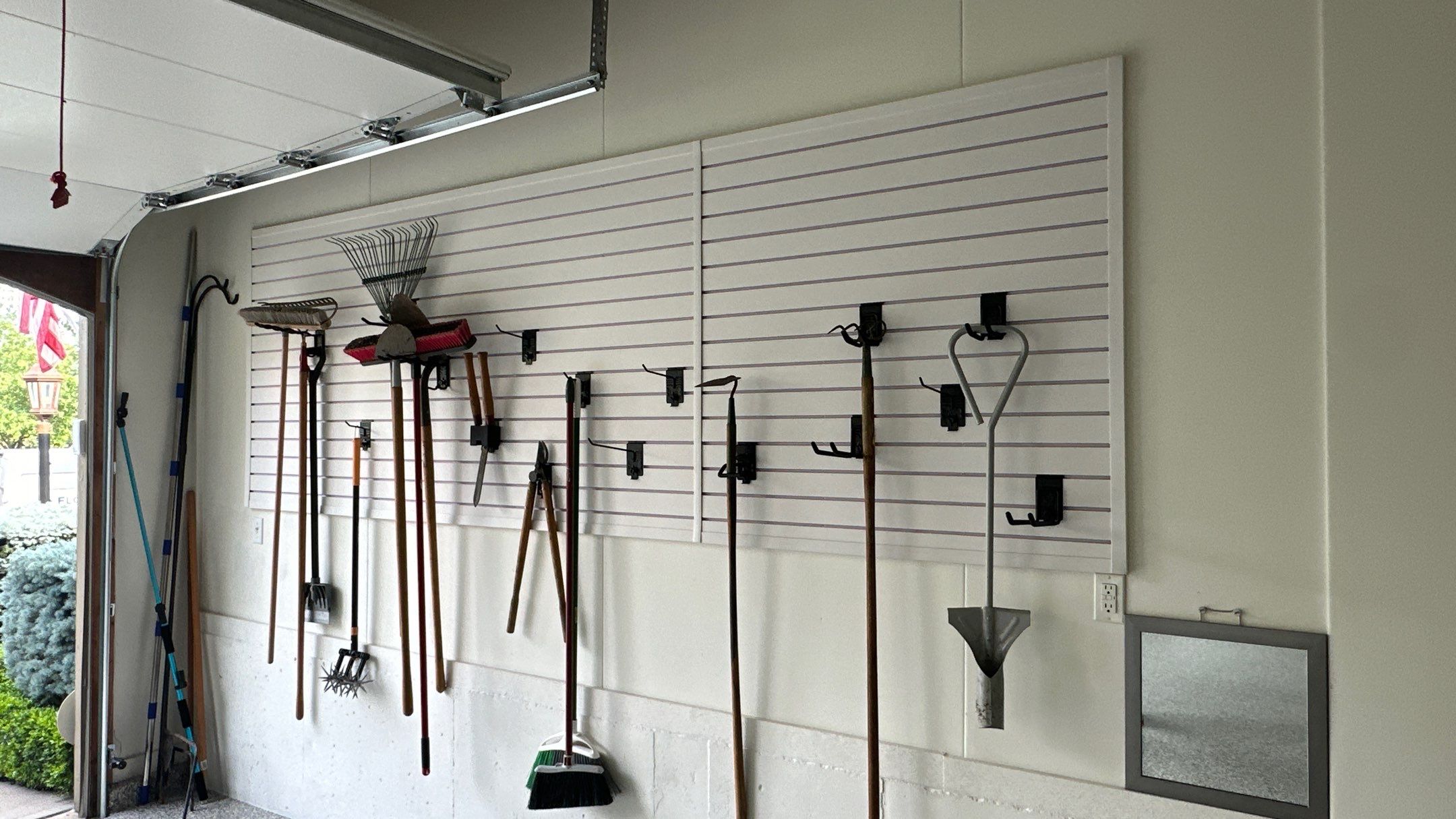 Steve L. went with brite white slotwall in his garage by Banner Garage