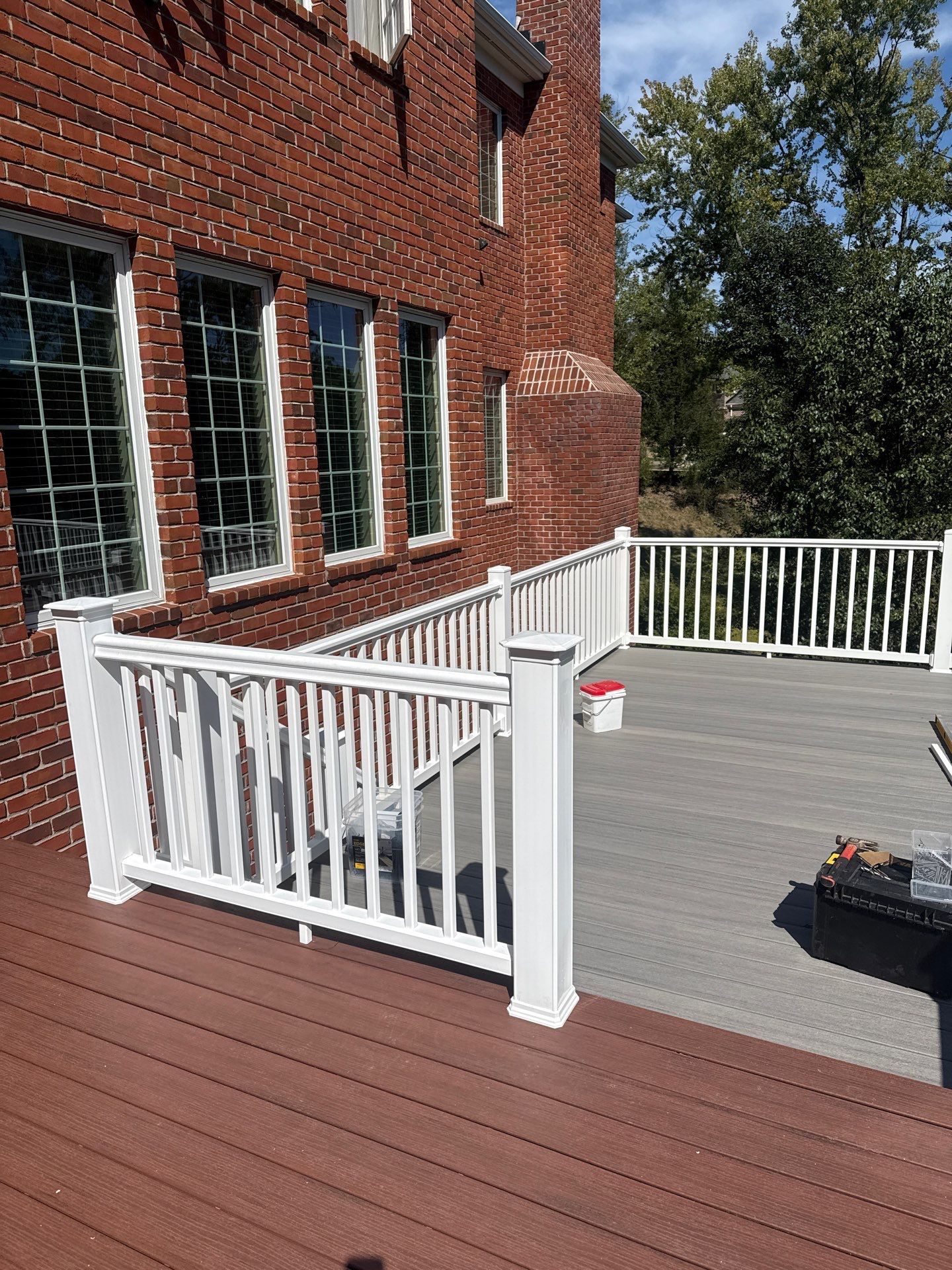 Deck extension  by Cousins Roofing Siding & Decks