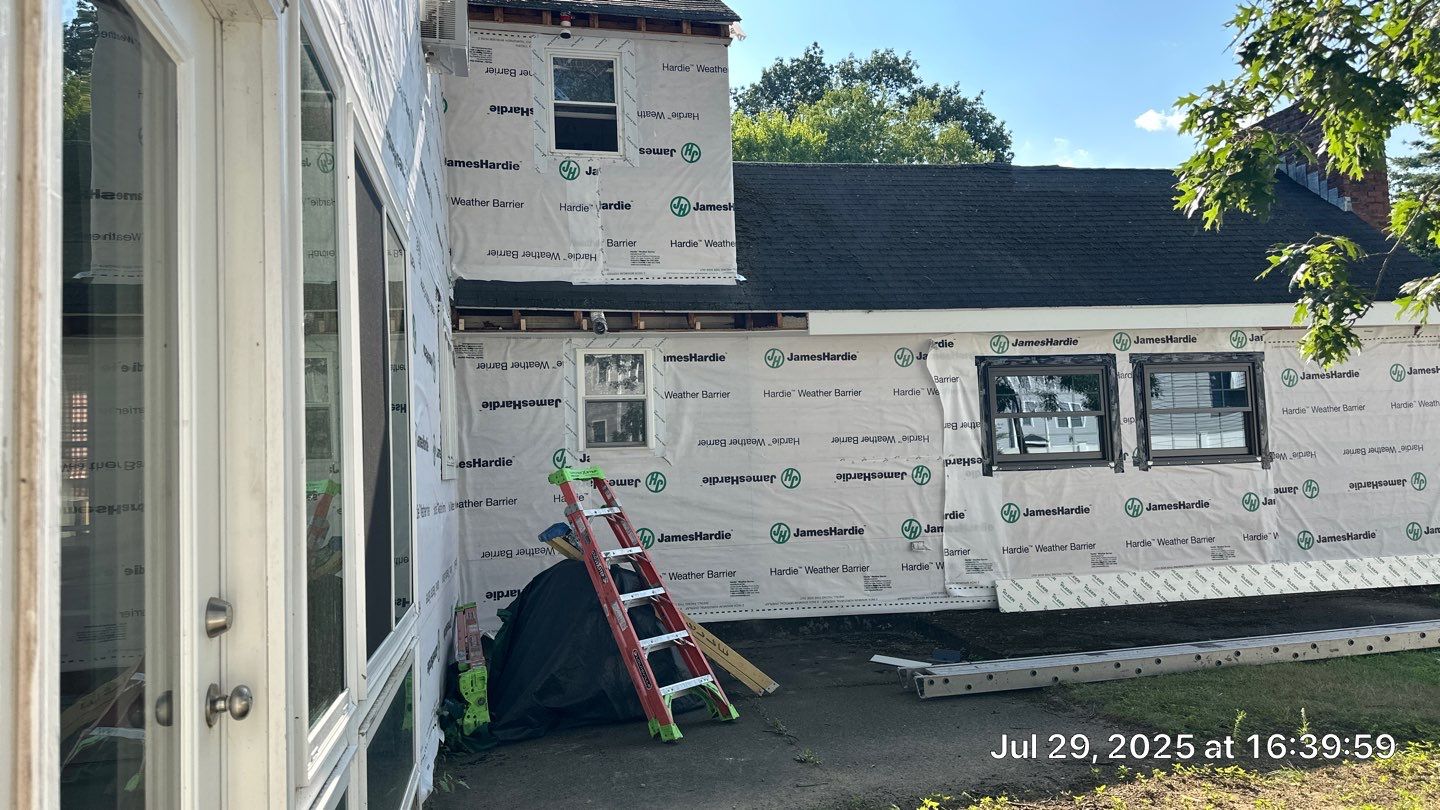 James Hardie Lap Siding Installation in Chelmsford, MA by Mighty Dog Roofing of Greater Middlesex County