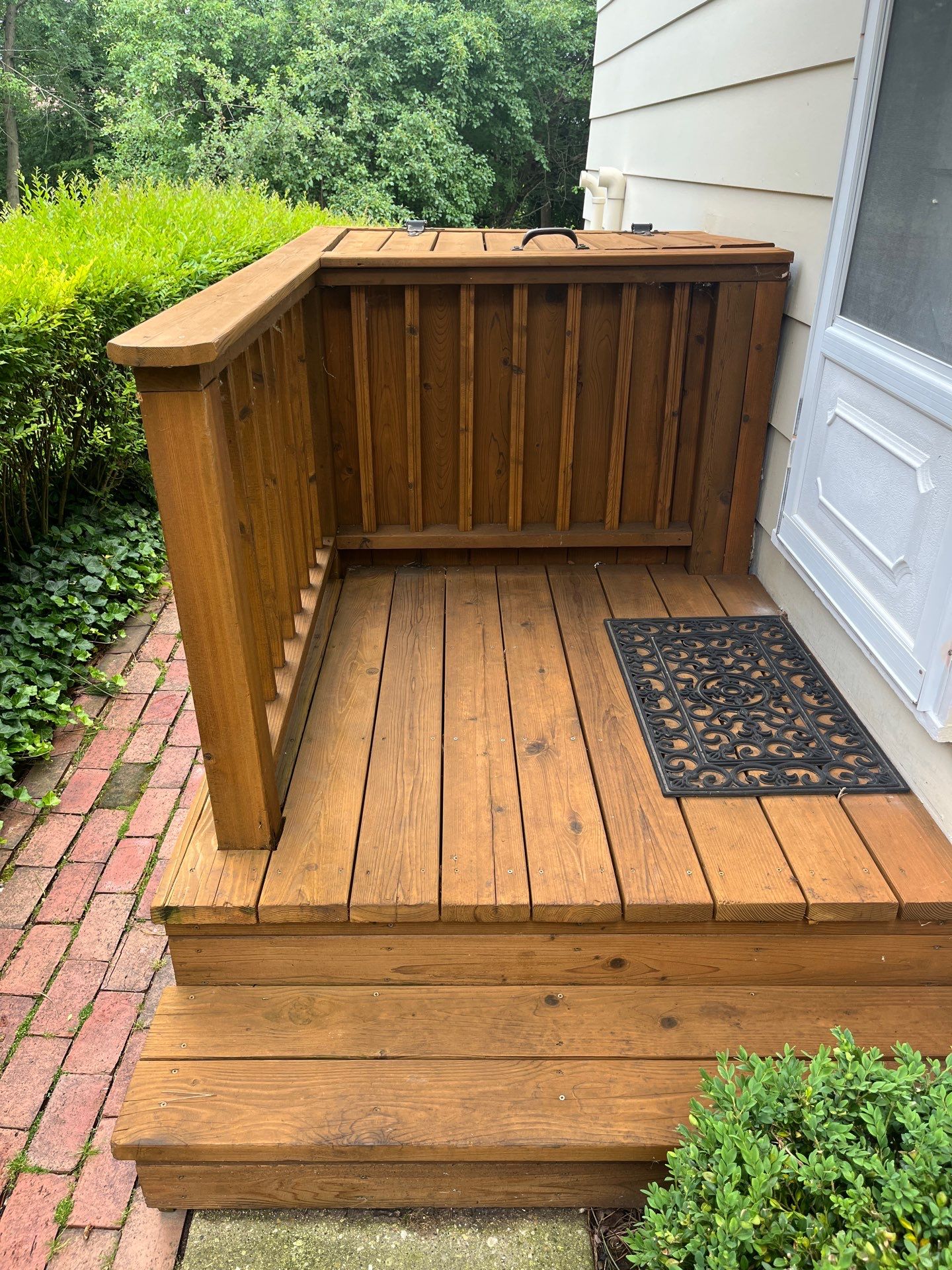 Wood cleaning and staining using Algaecide, soft wash soap by Northern Power Washing LLC.