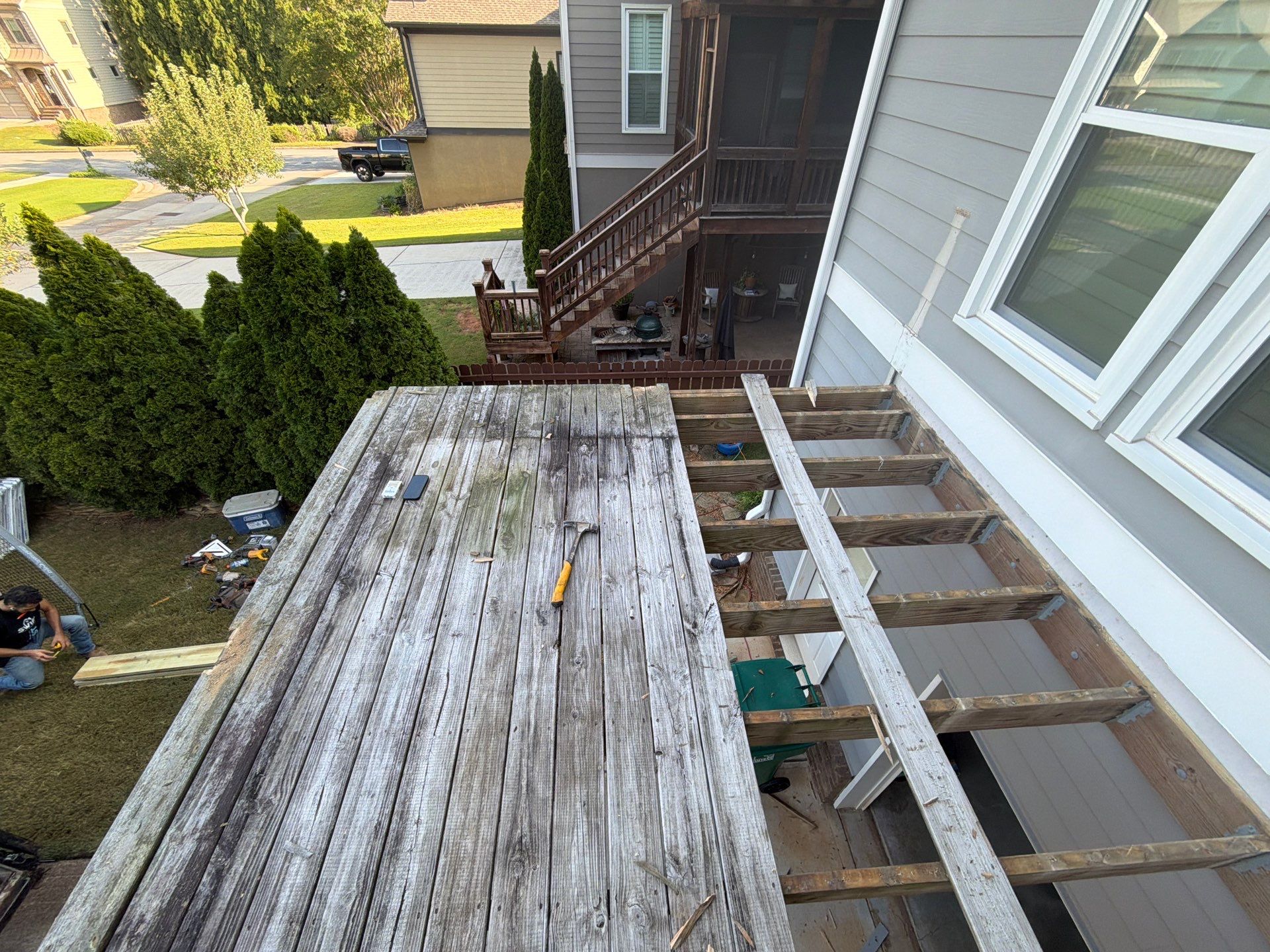 Elevated Composite Deck Replacement with Metal Railings in Smyrna by Swift Home Renovations 