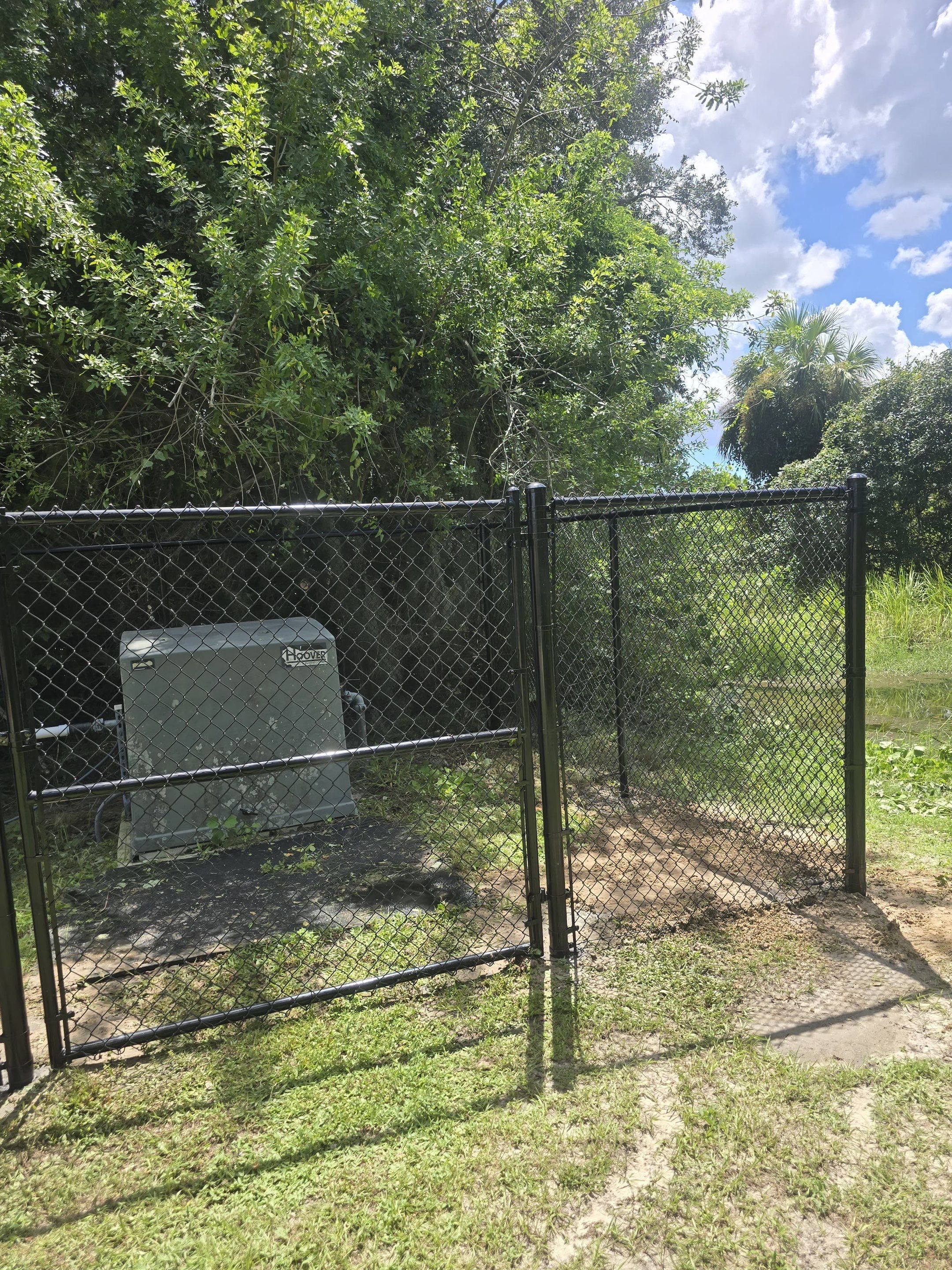 Commercial Black Chain Link Fence Installation in North Port by True Fence LLC