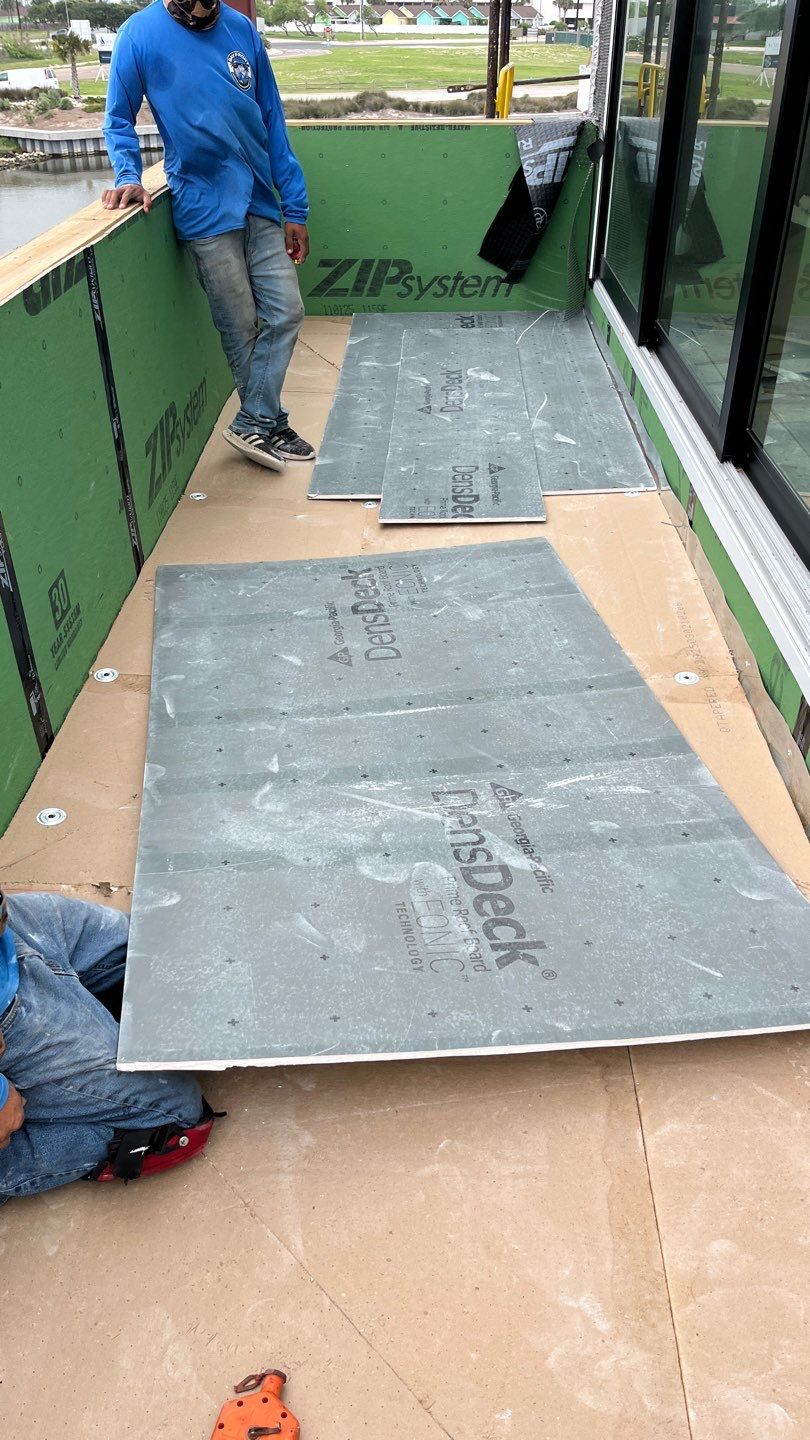 Walk Out, Island Style by Bayfront Roofing and Construction