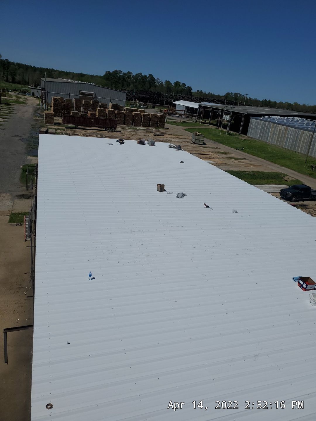 Commercial Roofing Installation using Aluminum Roofing panels by Hostetler Roofing