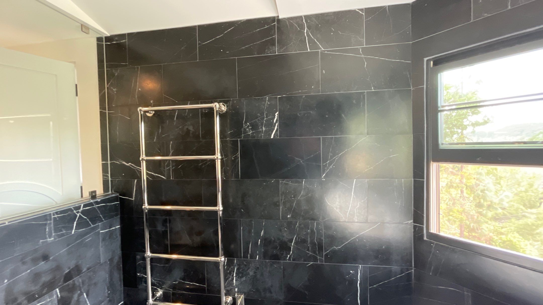 Marble shower restoration by The Beautiful Stone Company