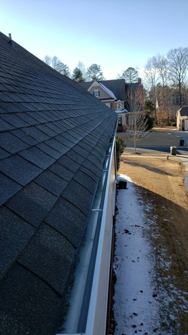 Gutter Cleaning using water by Power Wash Masters LLC