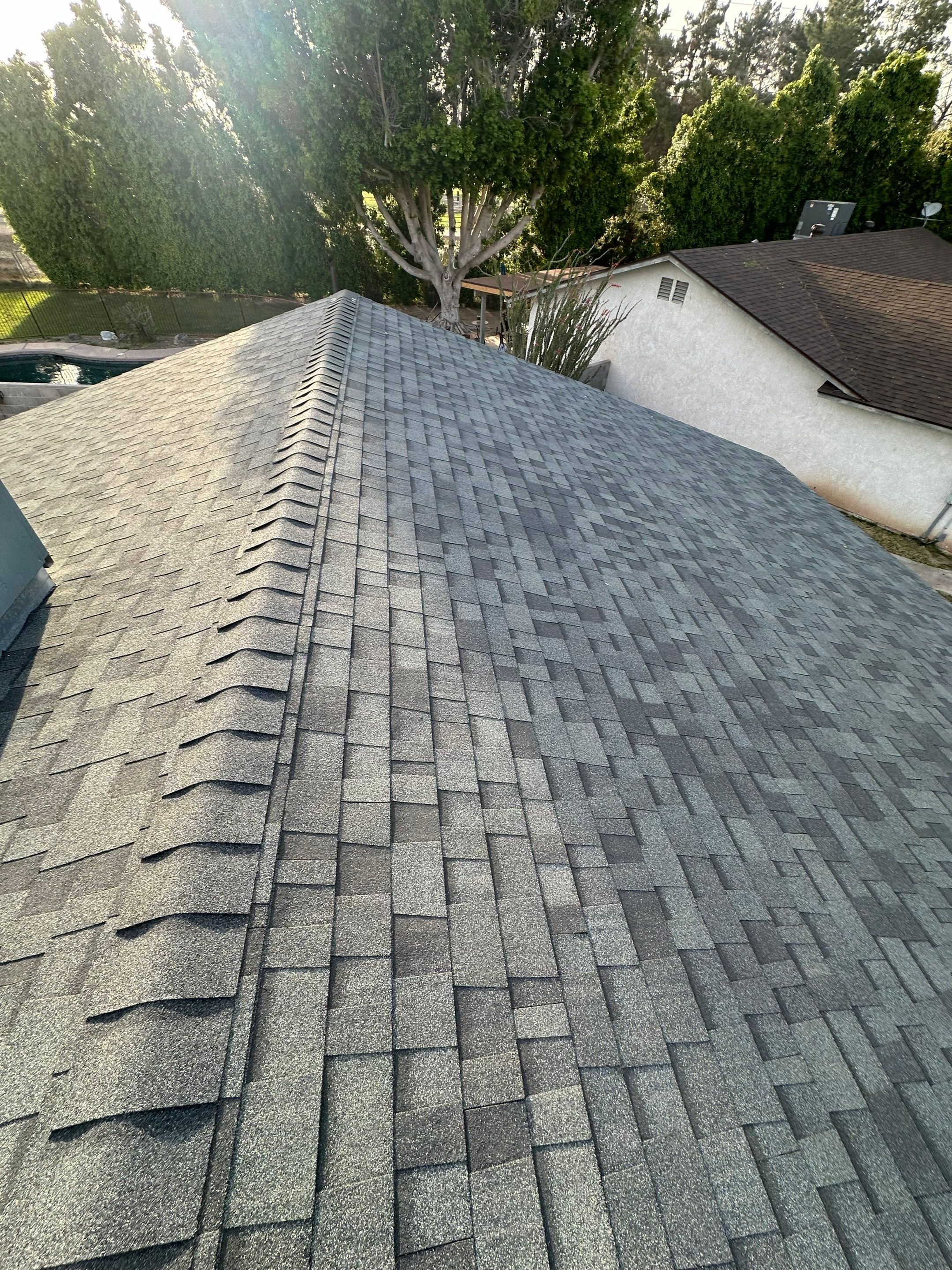 Estate Gray Shingles by Reimagine Roofing