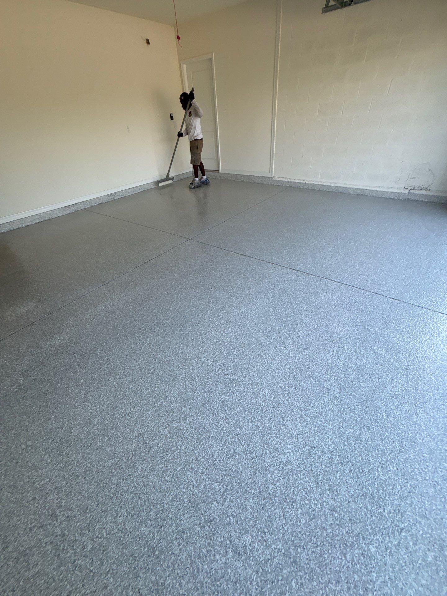 Flake Epoxy Garage Floor Coating System in Zephyrhills by Performance Floors & Coating
