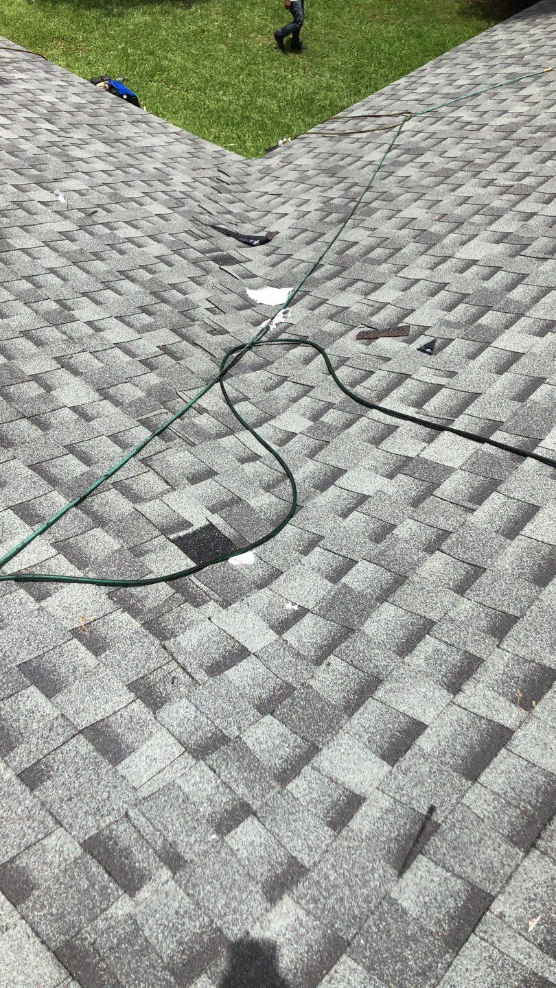 Residential Roofing Installation using Roof Replacement by American Roofing & Construction LLC