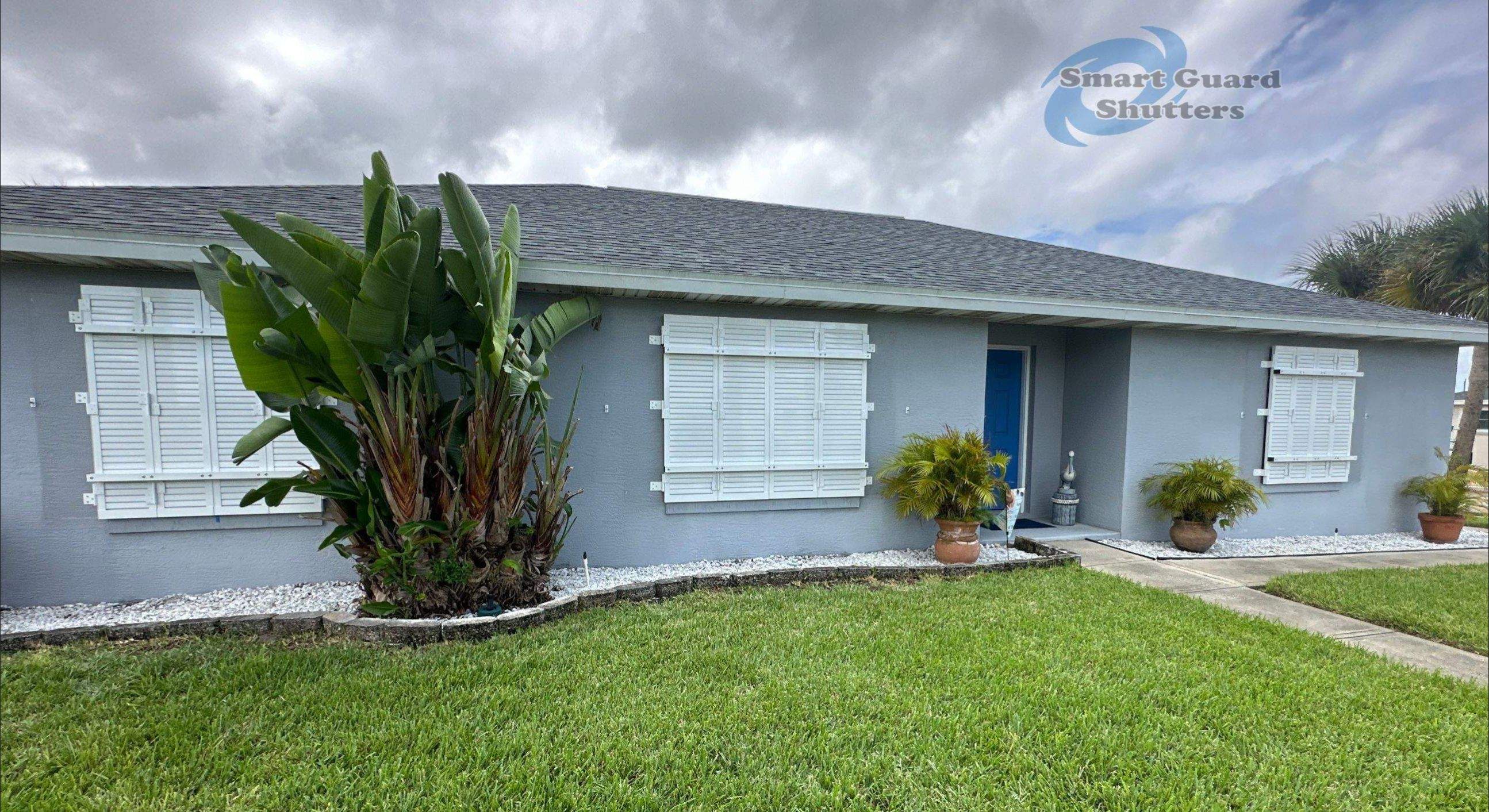 Impact Colonial Shutters in Signal White by Smart Guard Shutters