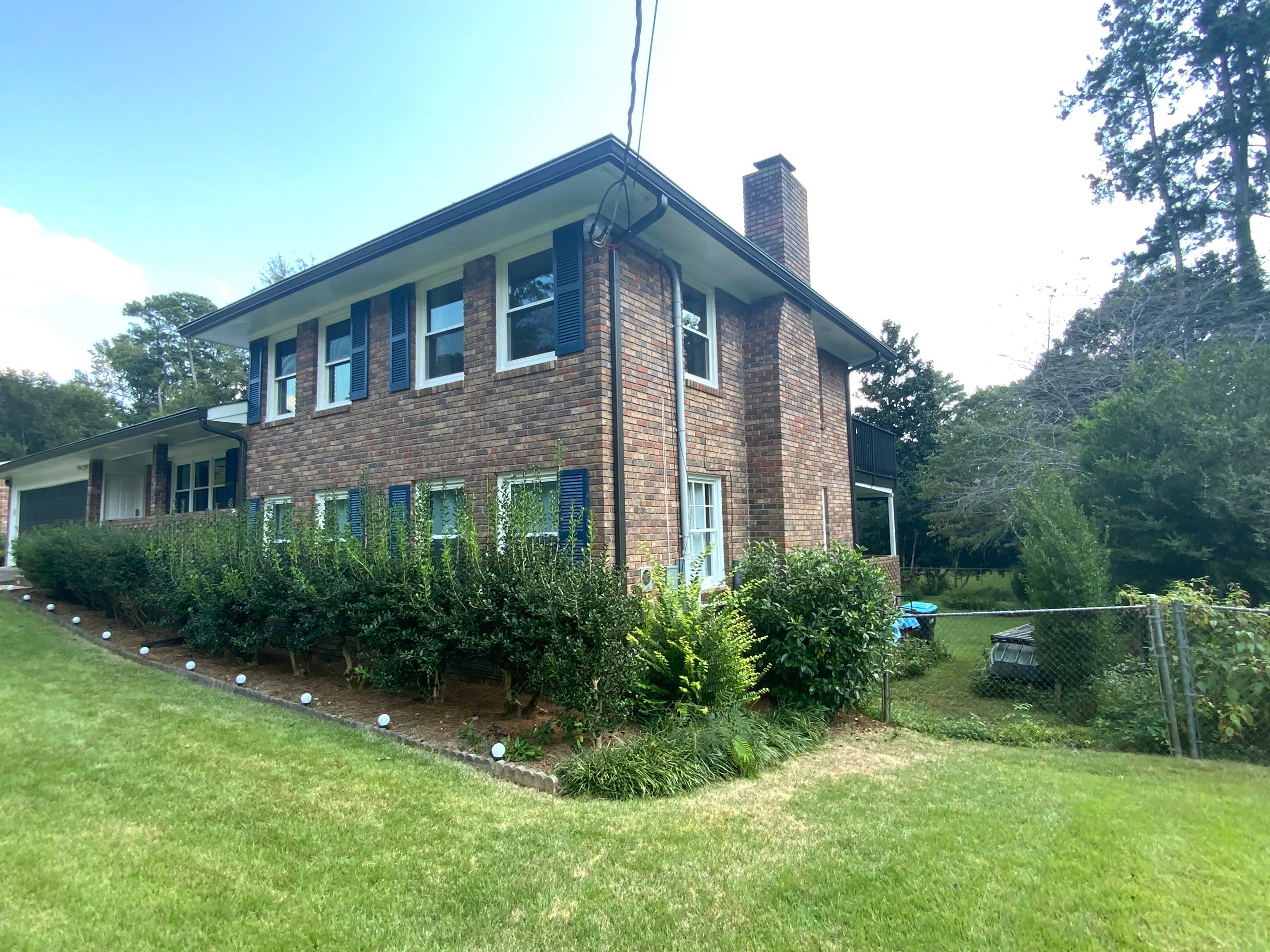 Full Exterior Trim Painting and Multi-Level Deck Staining by Swift Home Renovations