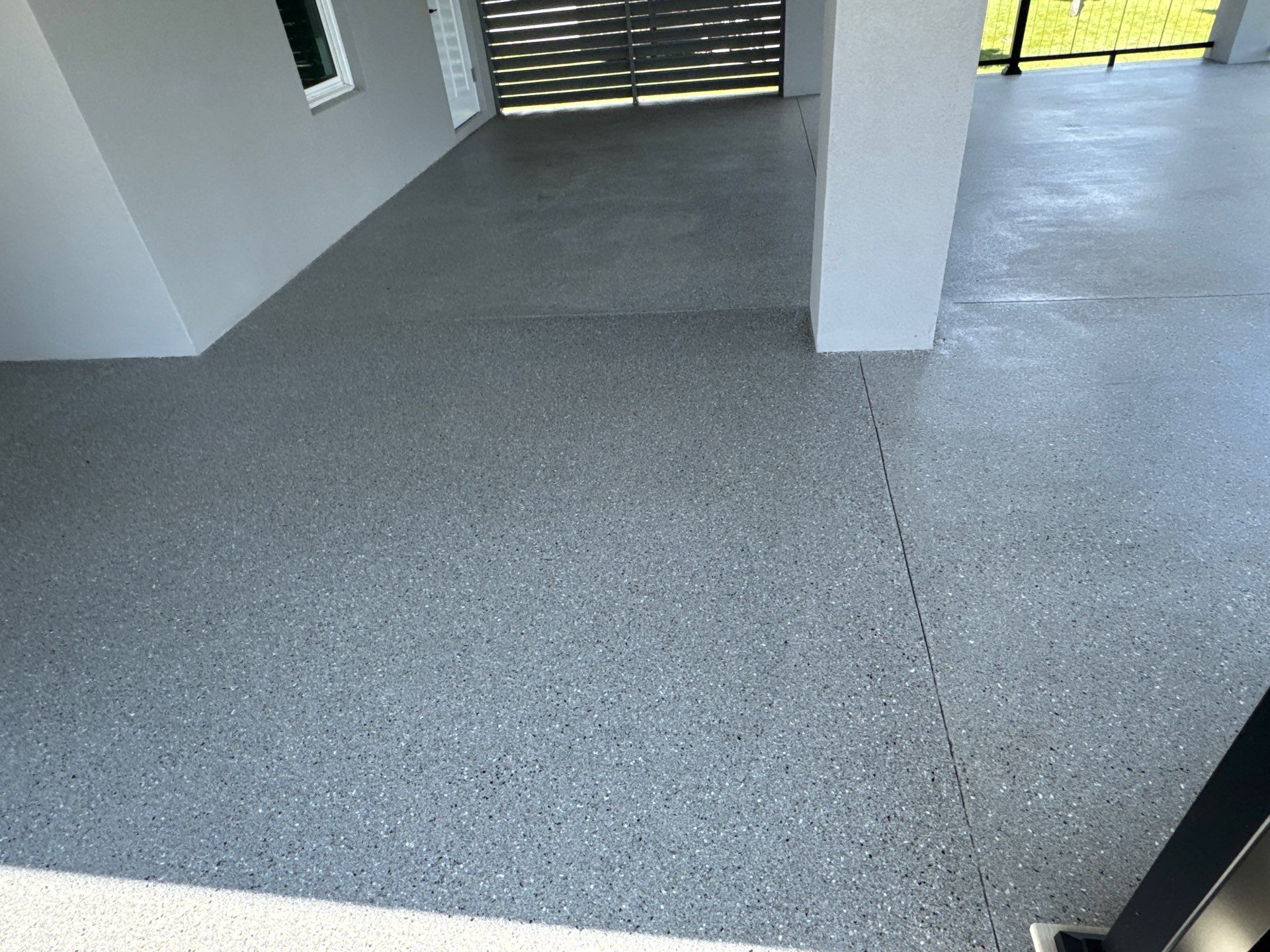 Under Side of Home in Hybrid Shale by Cross Creek Concrete Coatings