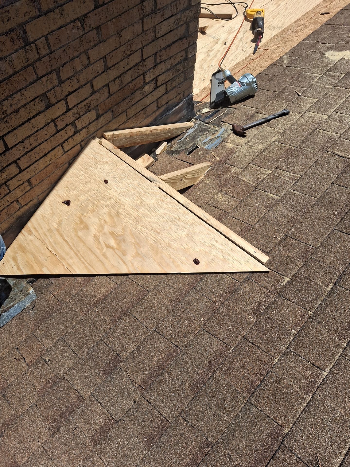 Chimneys need a Cricket.  by Bayfront Roofing and Construction