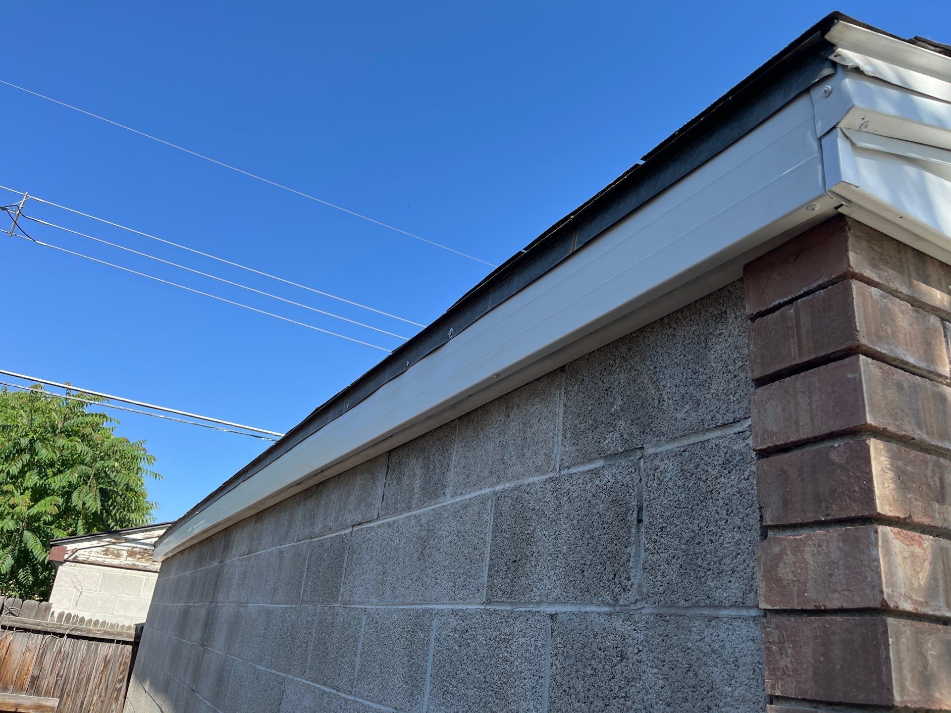 Salt Lake City | Targeted Vinyl Repair & Fascia Update | Crisp White by Ideal Siding Utah