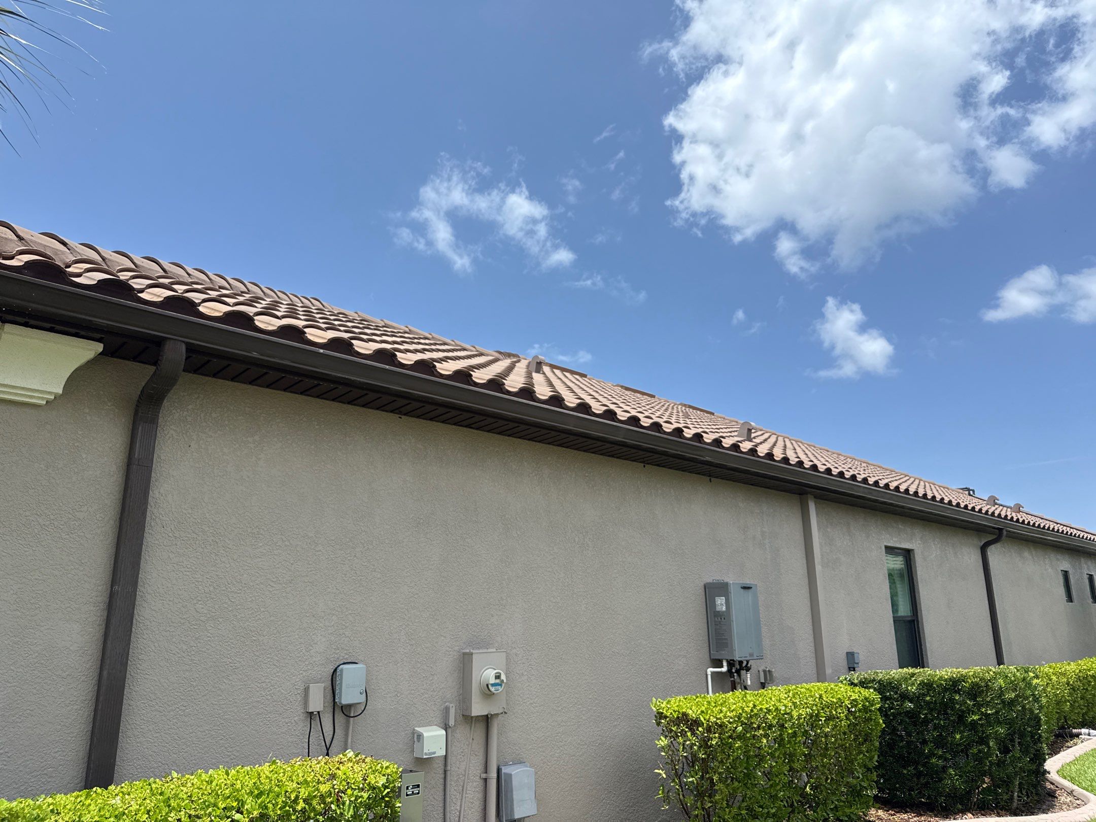 Neighboring Tile Roof Cleaning with Gutter Runoff Control – Palmetto, FL by Sunshine AquaWash