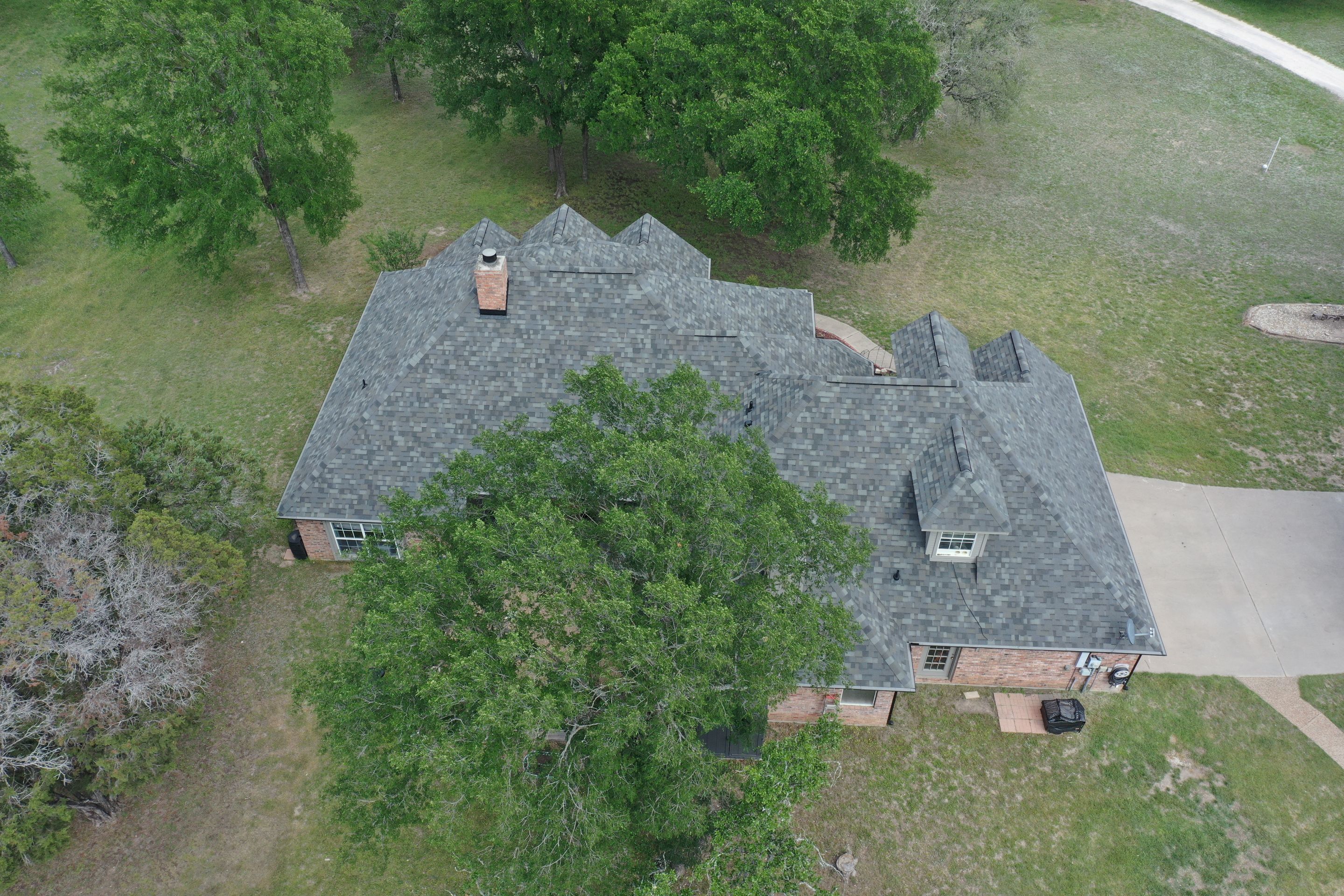 Residential Roof Replacement using Malarkey Vista AR - Storm Grey by Action Exteriors Austin