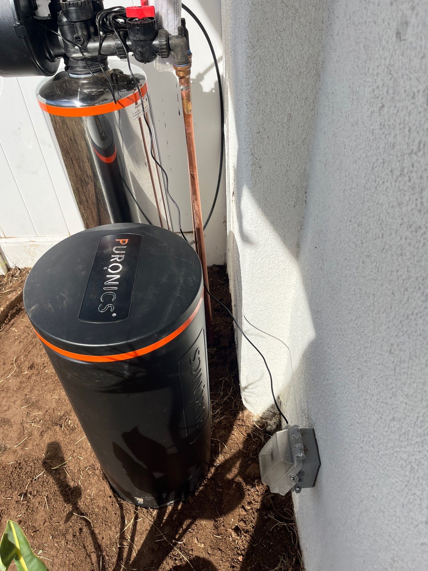 Installing Water Treatment by Us Plumbing