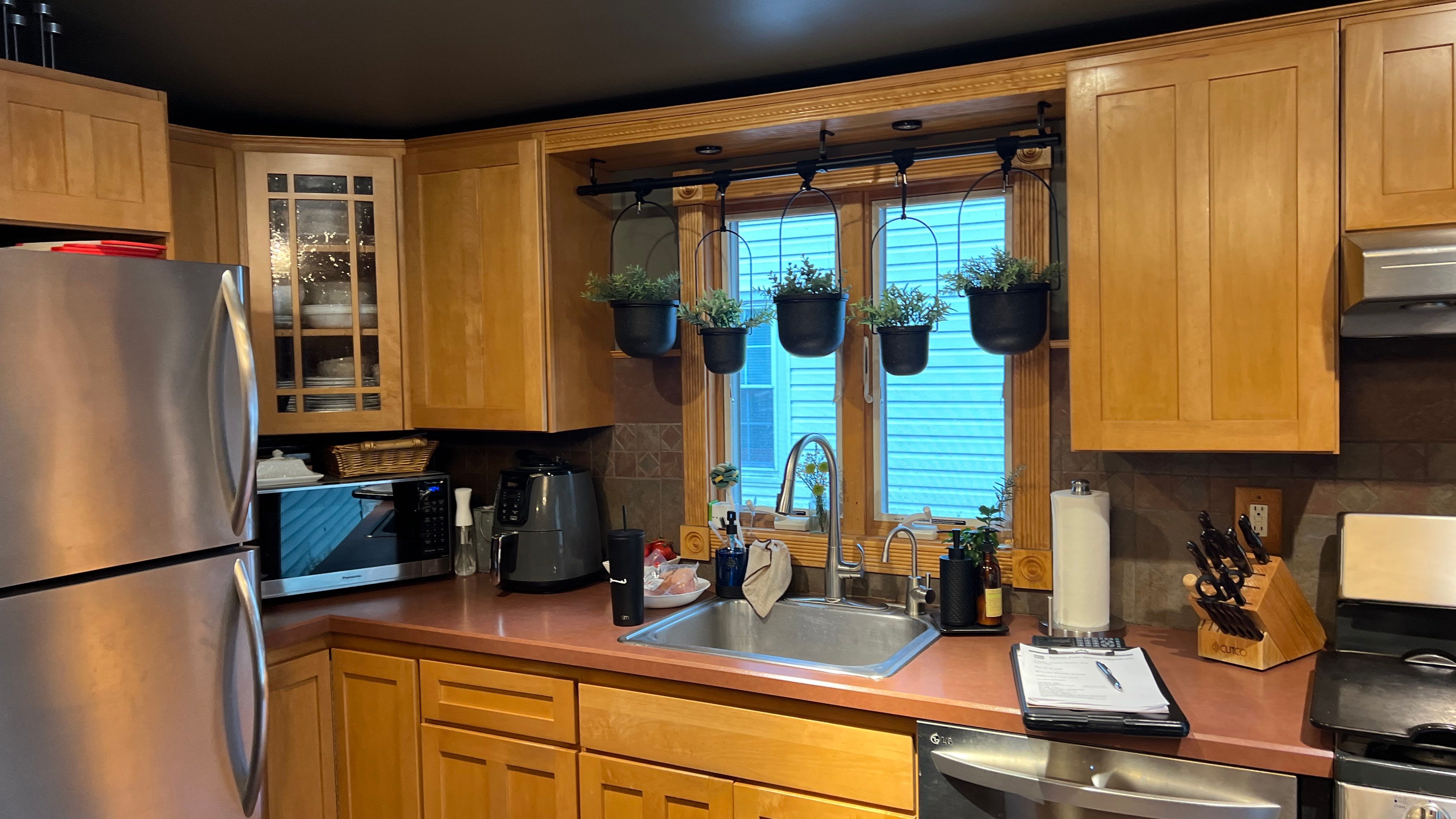 Cabinet Refinishing using Benjamin Moore Command Satin by Spectrum Painting, LLC