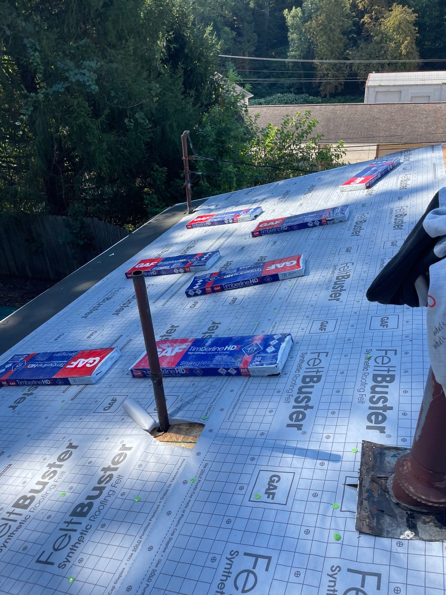 Residential Roofing Installation using GAF TImberline HDZ Hickory by Rainstoppers Roofing