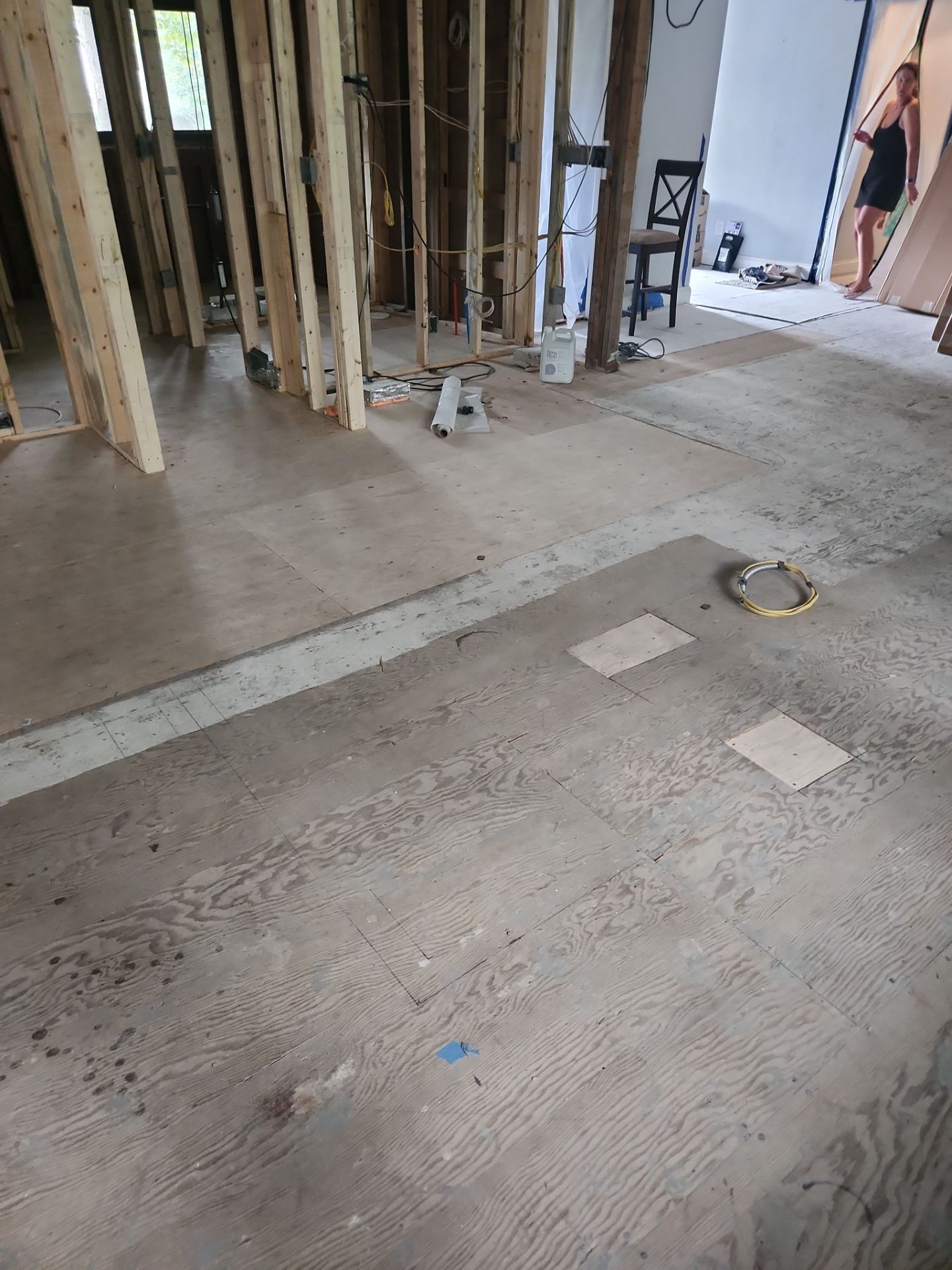 New Flooring installation using 4" White oak select grade plain sawn Ebony Stain by Ann Arbor Hardwoods