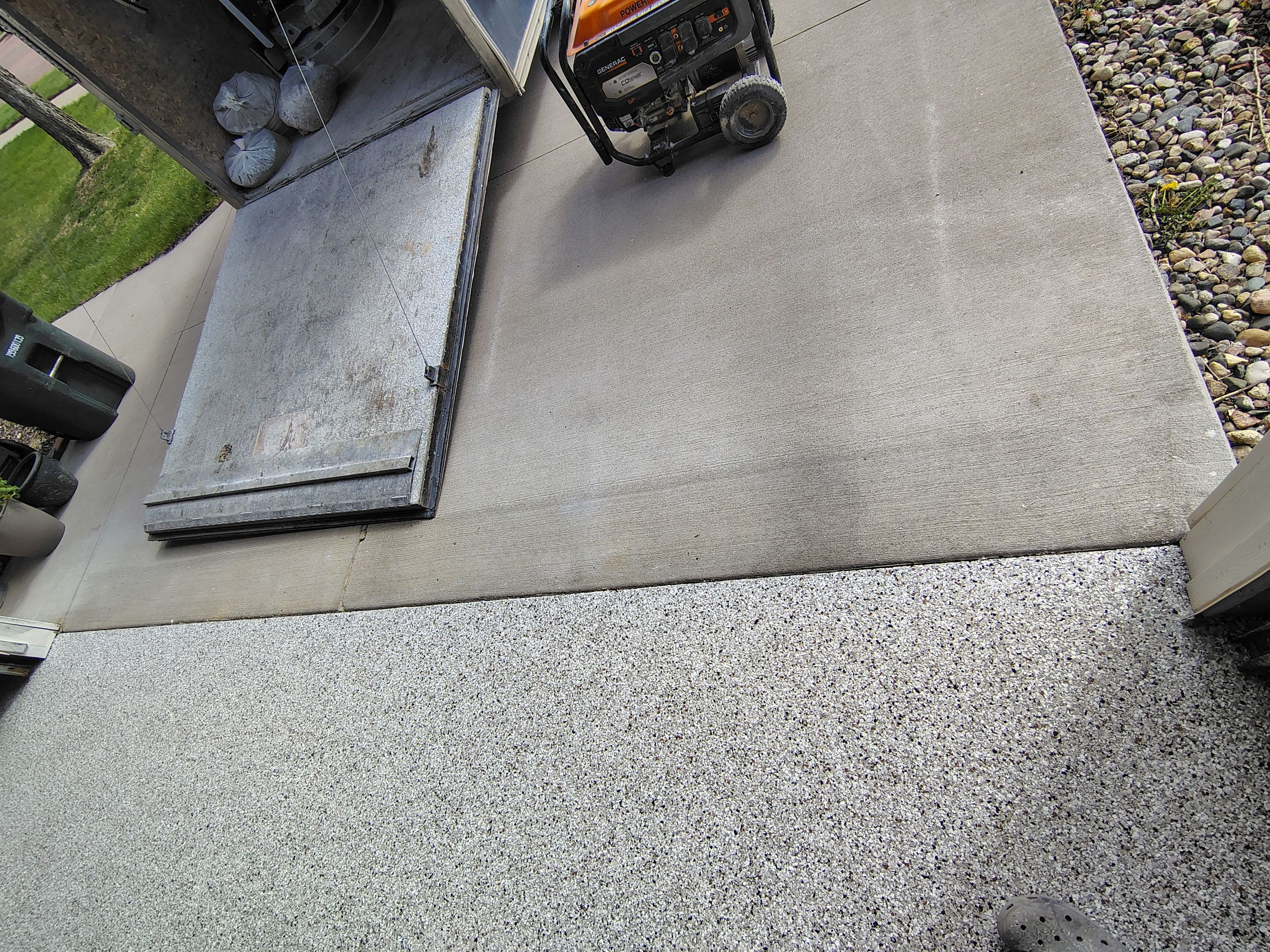 Sioux Falls Garage Epoxy Floor Installation and Concrete Crack Repair by Select Painting, Coatings & Garage Cabinets