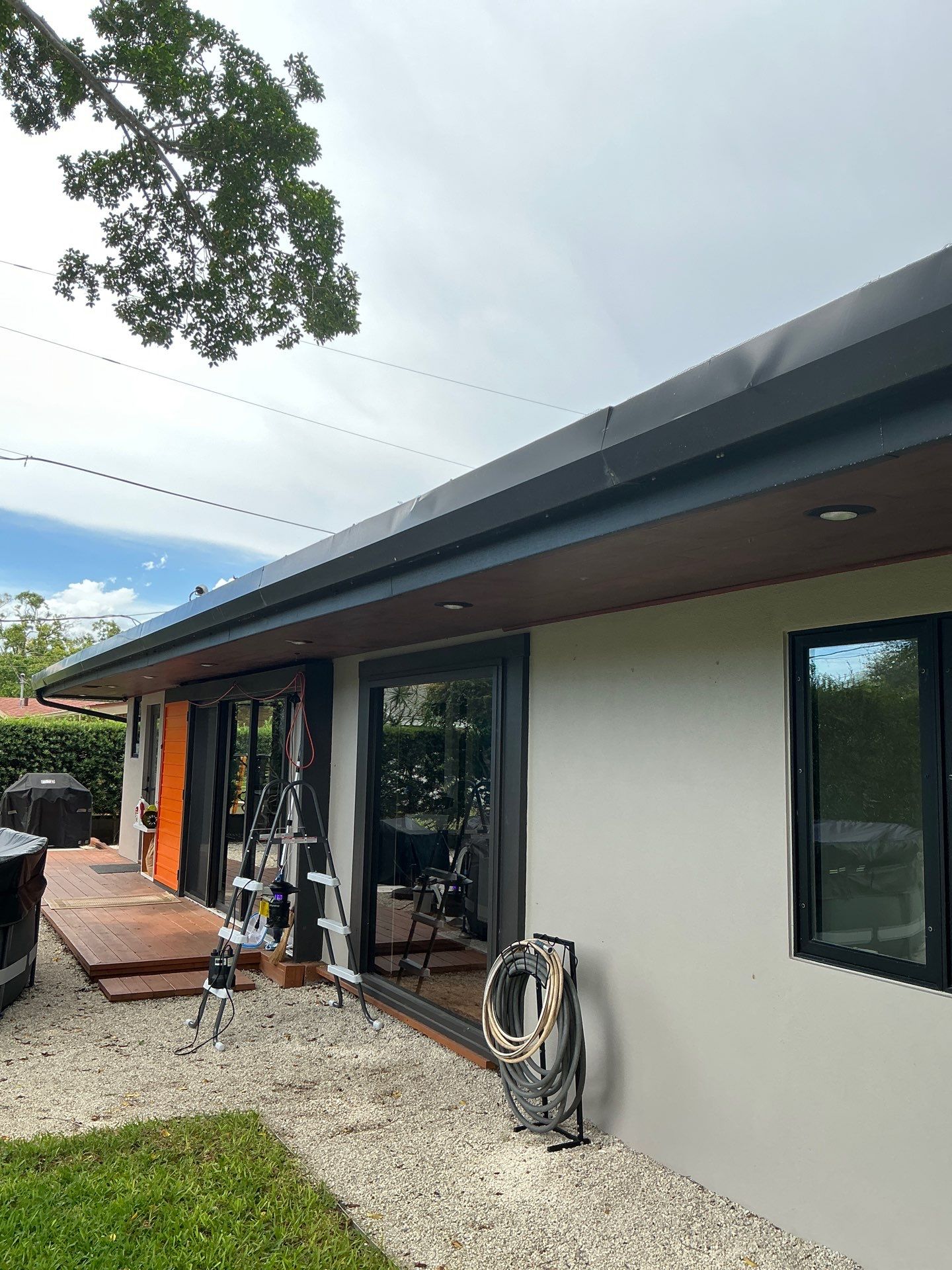 Black Seamless Gutters in Sarasota FL by Gutter Professors