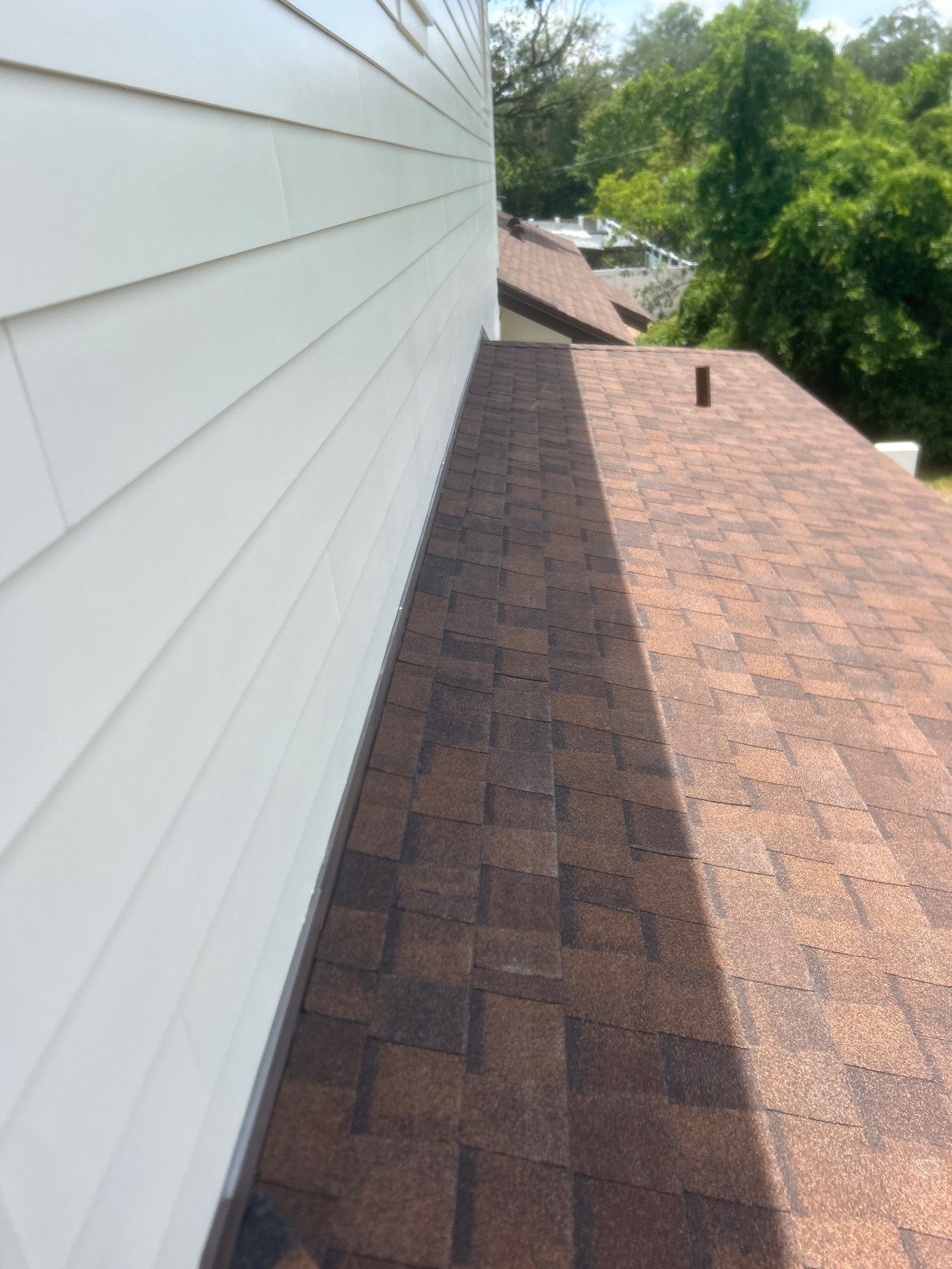 Residential Architectural Shingle Re-Roof Project in Winter Park by Tip Top Roofing Co., Inc.