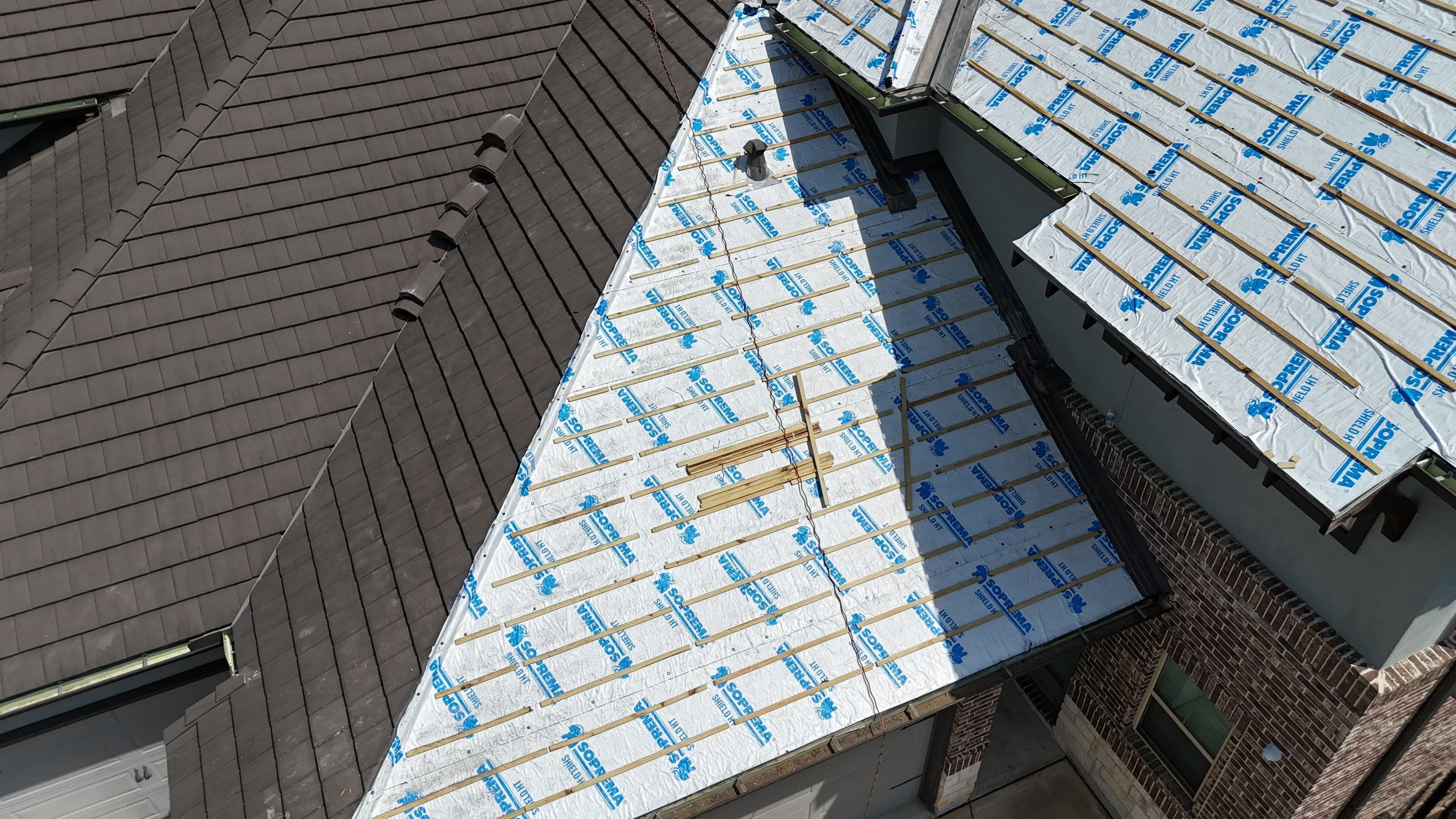 Saxony Tile Repair in Bridgeland!  by Core Four Roofing
