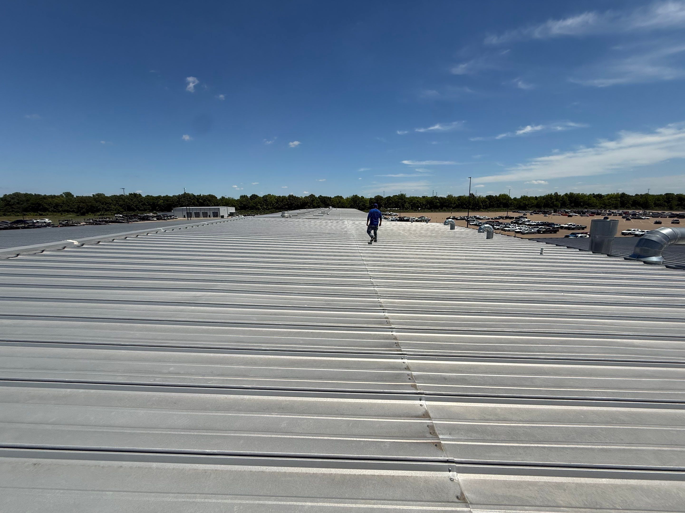Commercial Metal Roof Repair and Skylight Sealing in West Memphis by Revival Roofing Services