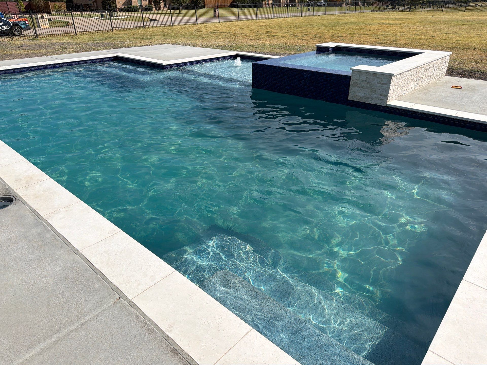 Modern Geometric Pool with Raised Spa by Pinnacle Pools and Spas - DFW