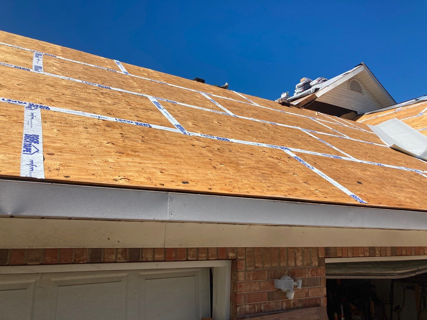 Residential Roofing Installation using Roof Replacement by American Roofing & Construction LLC