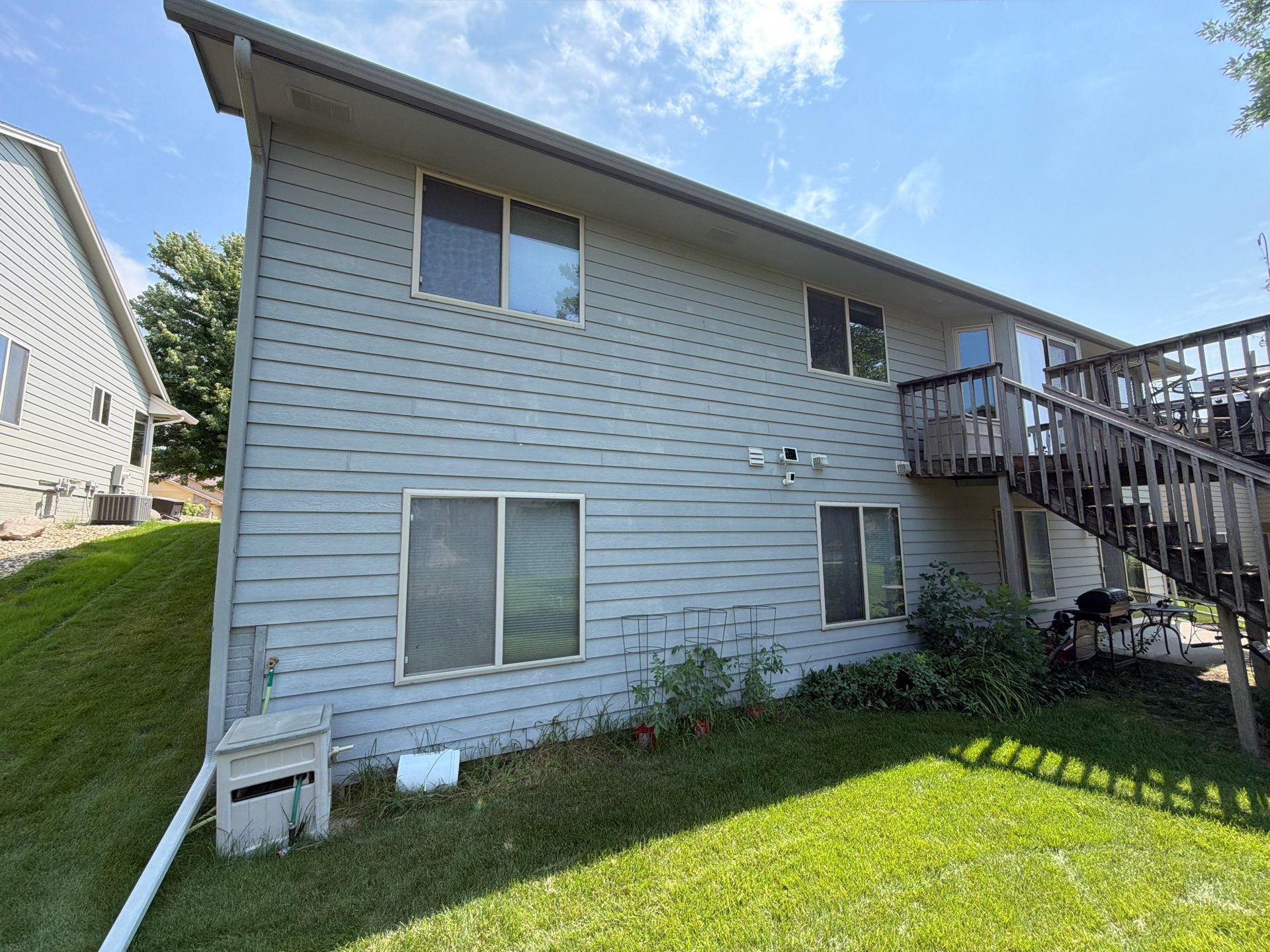 Exterior Painting for Vinyl Siding and Trim in Sioux Falls by Select Painting, Coatings & Garage Cabinets