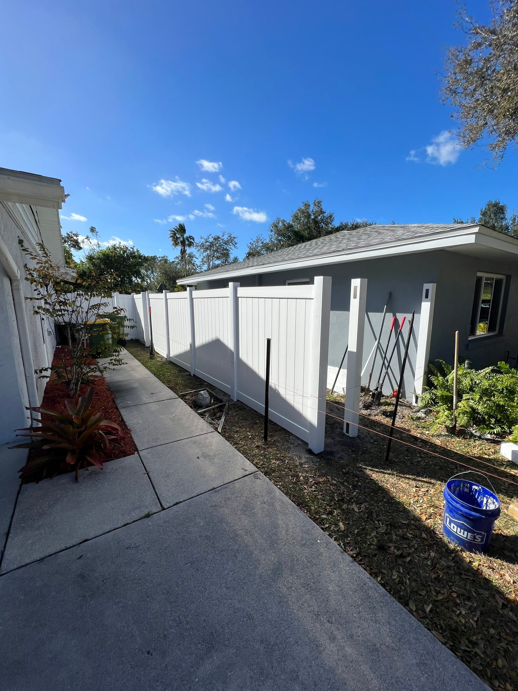 Vinyl Privacy Fence With AC Enclosure and Storage Corral by Asap fence and gates, LLC