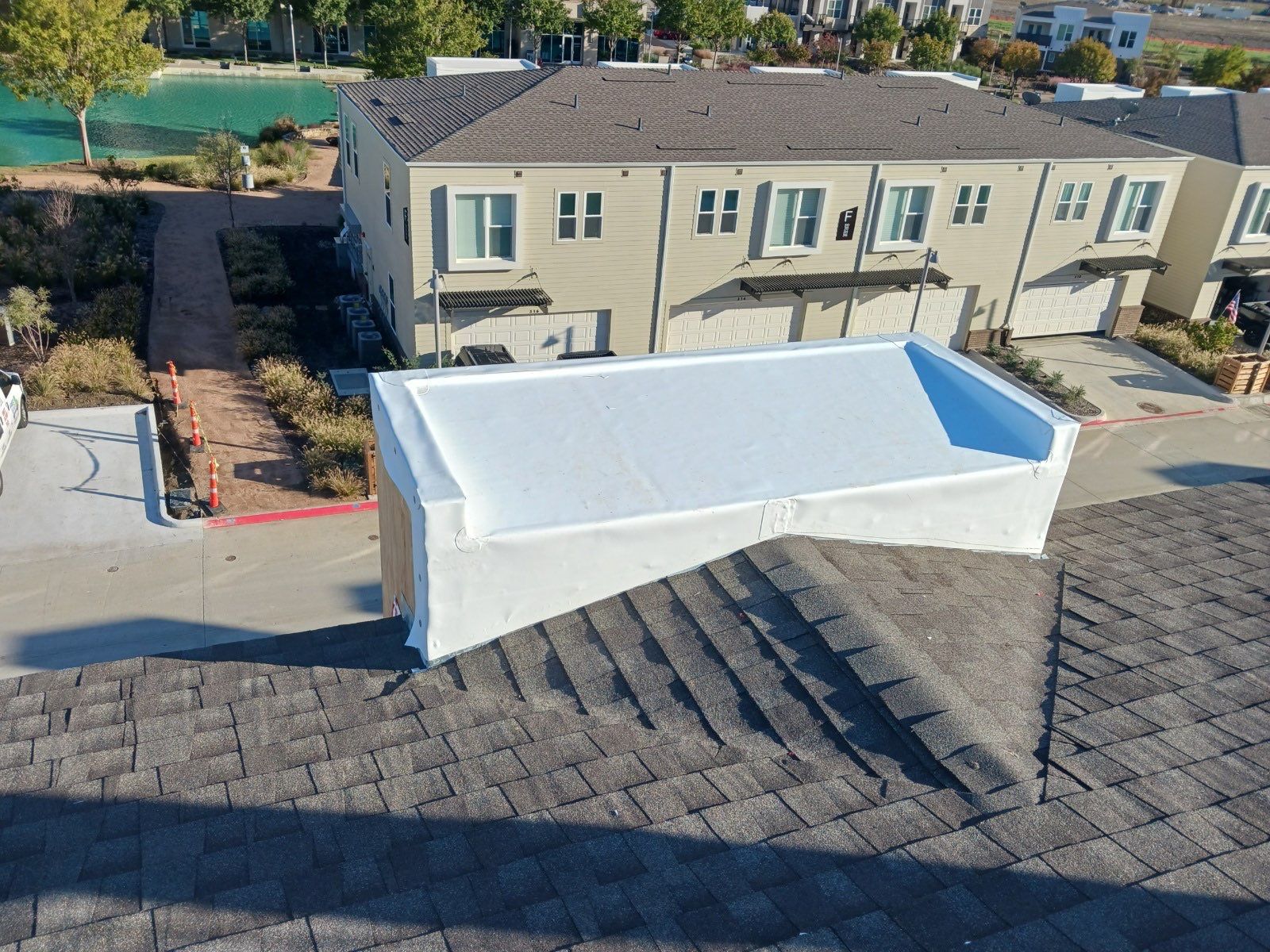 Apartment Roofing Installation using GAF HDZ Shingles, GAF TPO and Pavers in Lewisville, TX by Roof Experts