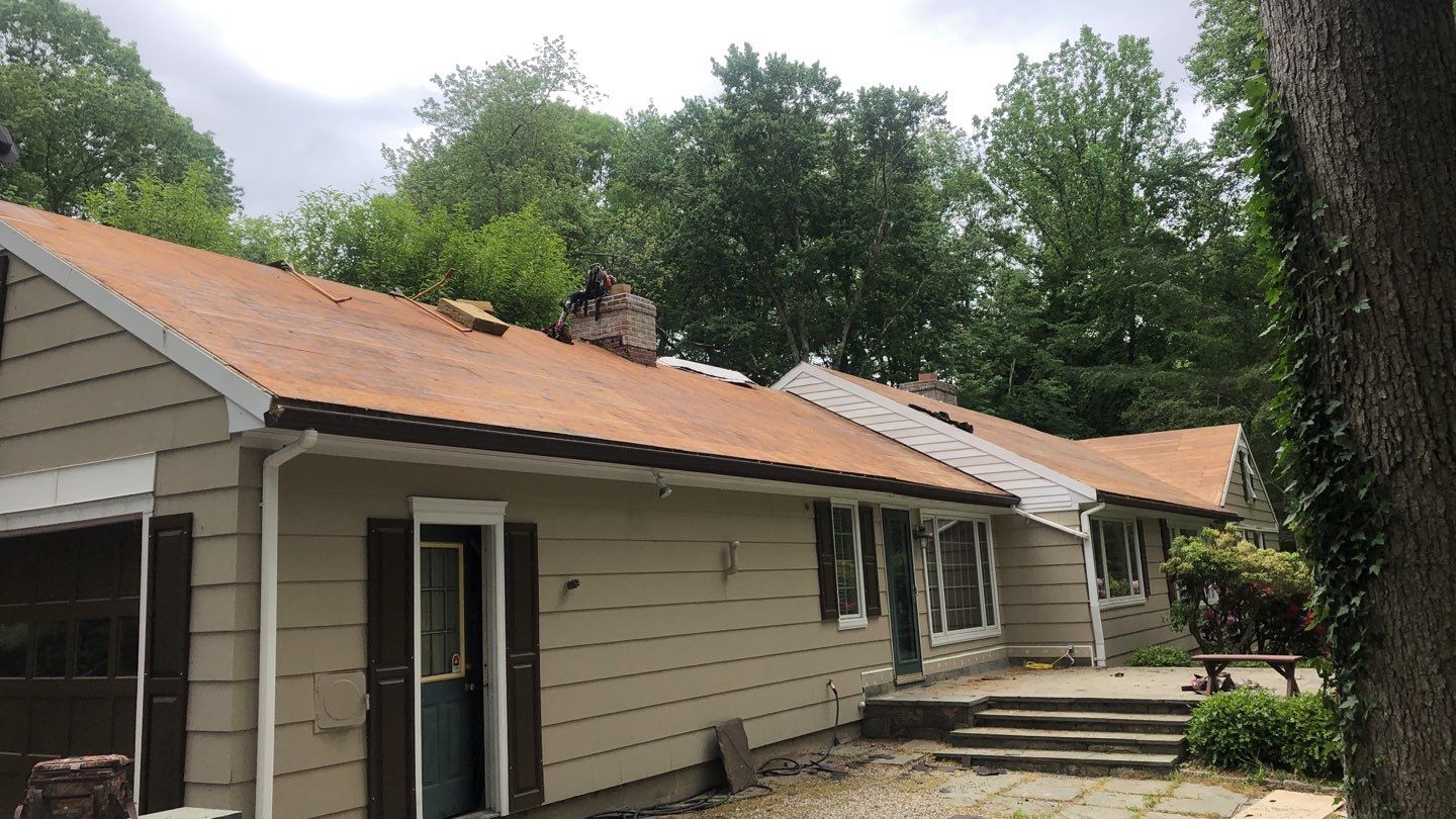 Commercial Roofing Installation using Owens Corning Duration Driftwood by A Plus Exterior