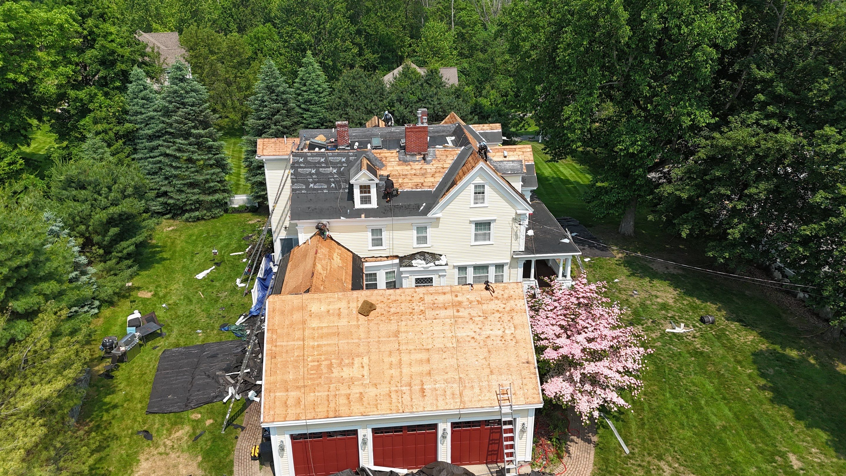 Full Roof Replacement & EPDM Restoration – North Andover, MA by Mighty Dog Roofing of Greater Middlesex County