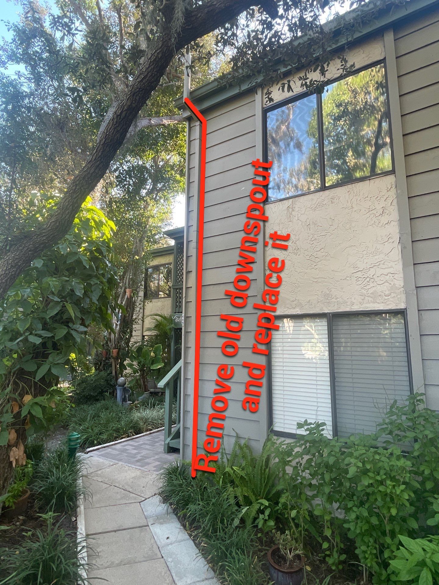 White Gutters Repair and Installation in Sarasota FL by Gutter Professors