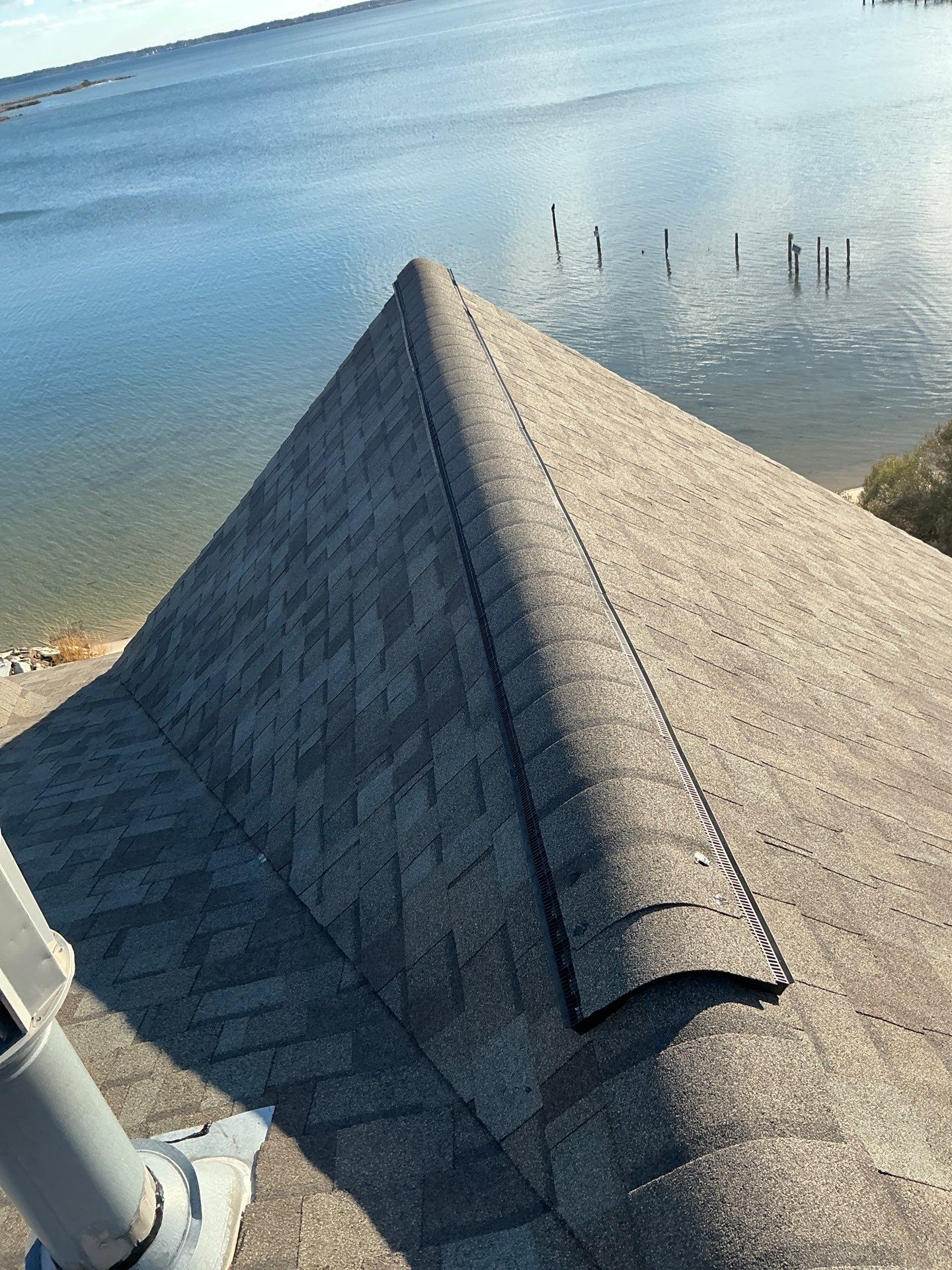 Waterfront Roof Replacement in White Stone, VA by Cade Construction