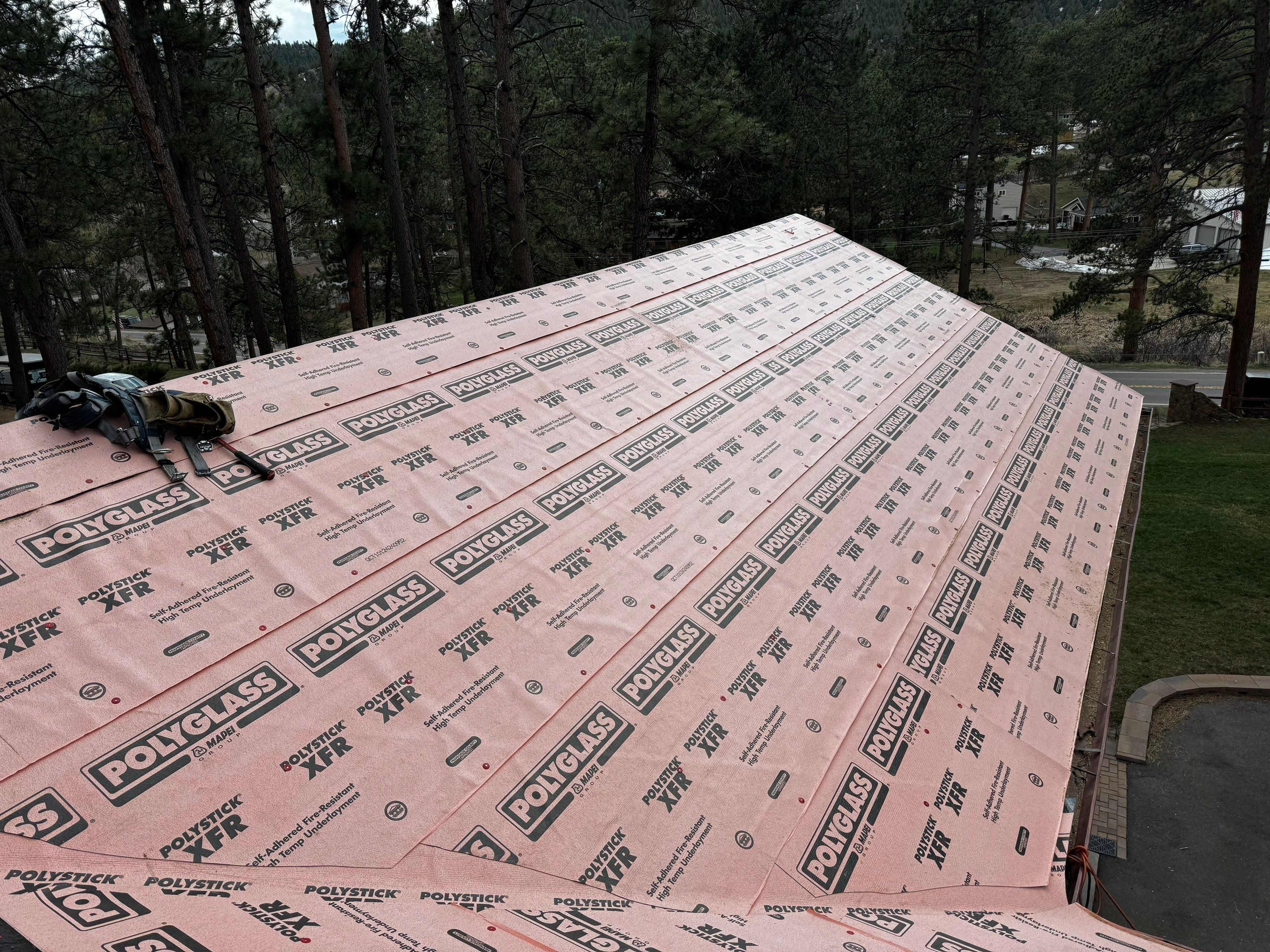 Residential Roofing Installation using Standing Seam Metal by Blue Peaks Roofing LLC 