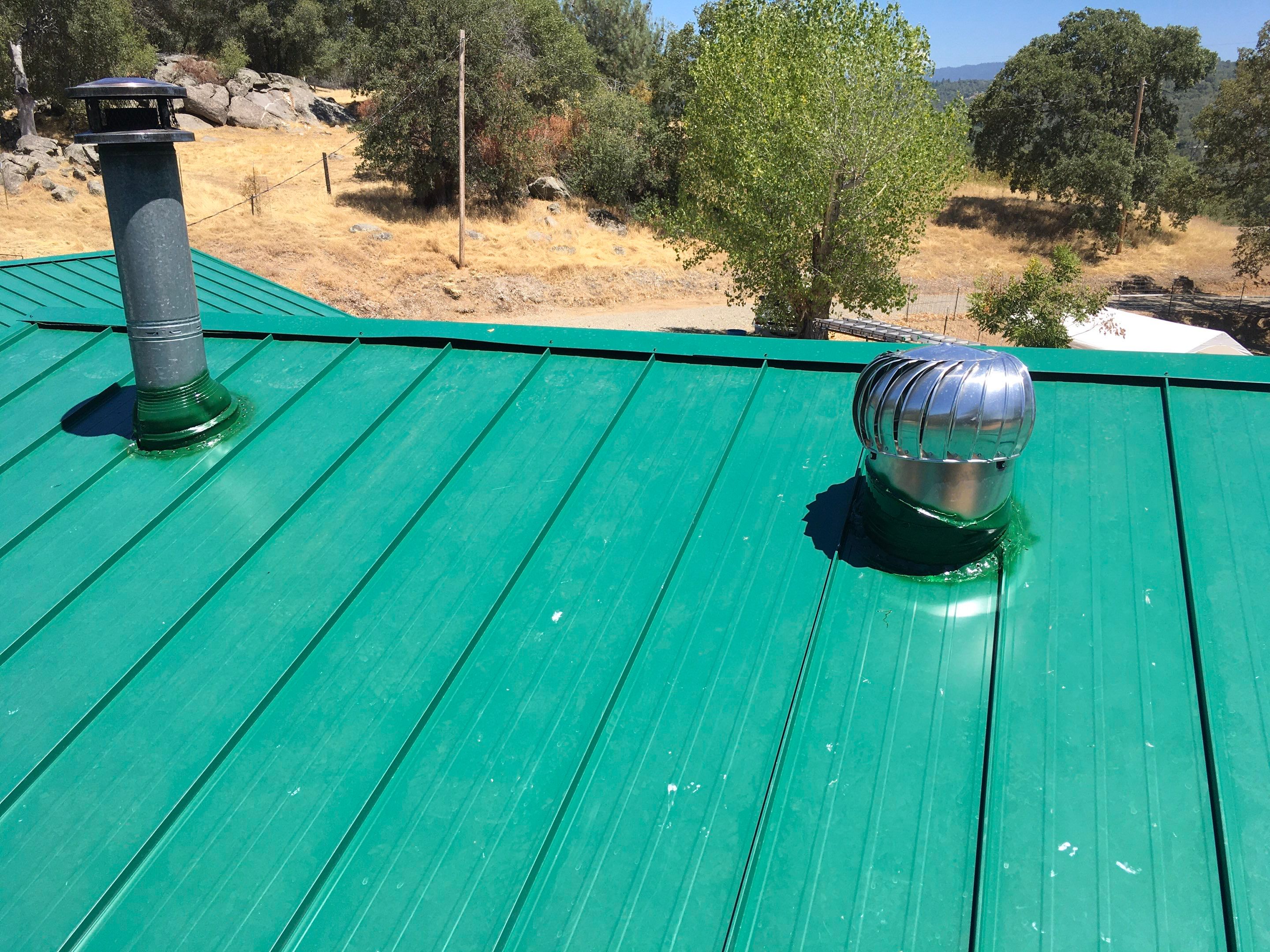 Metal roofing installation using Standing seam metal roofing system by Straight Edge Roofing Inc