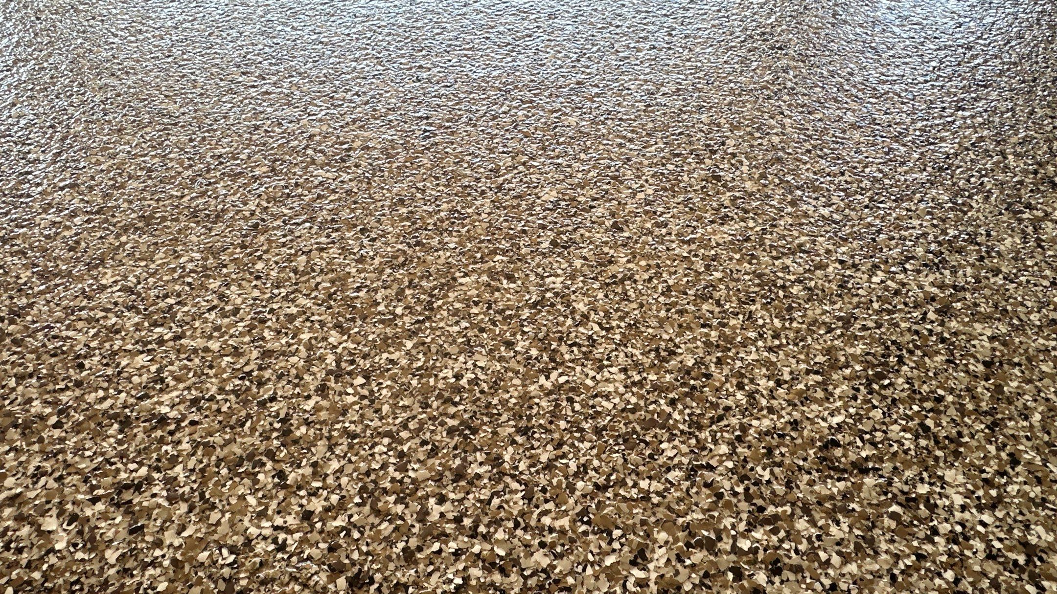 Check out how much a difference a new flake floor can make  by Banner Garage