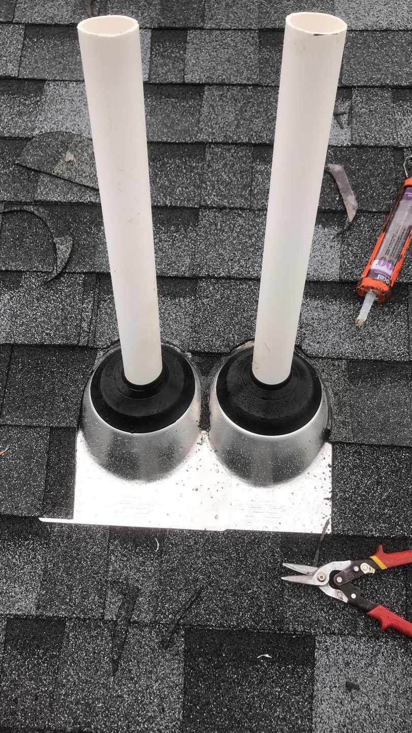 Commercial Roofing Installation using EPDM with white gutters by A Plus Exterior