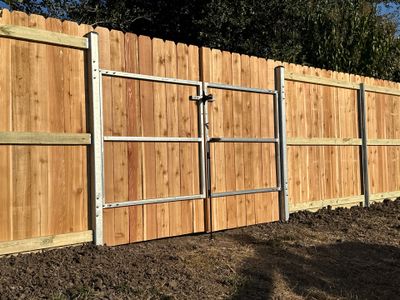 Beautiful Wood fence with metal posts