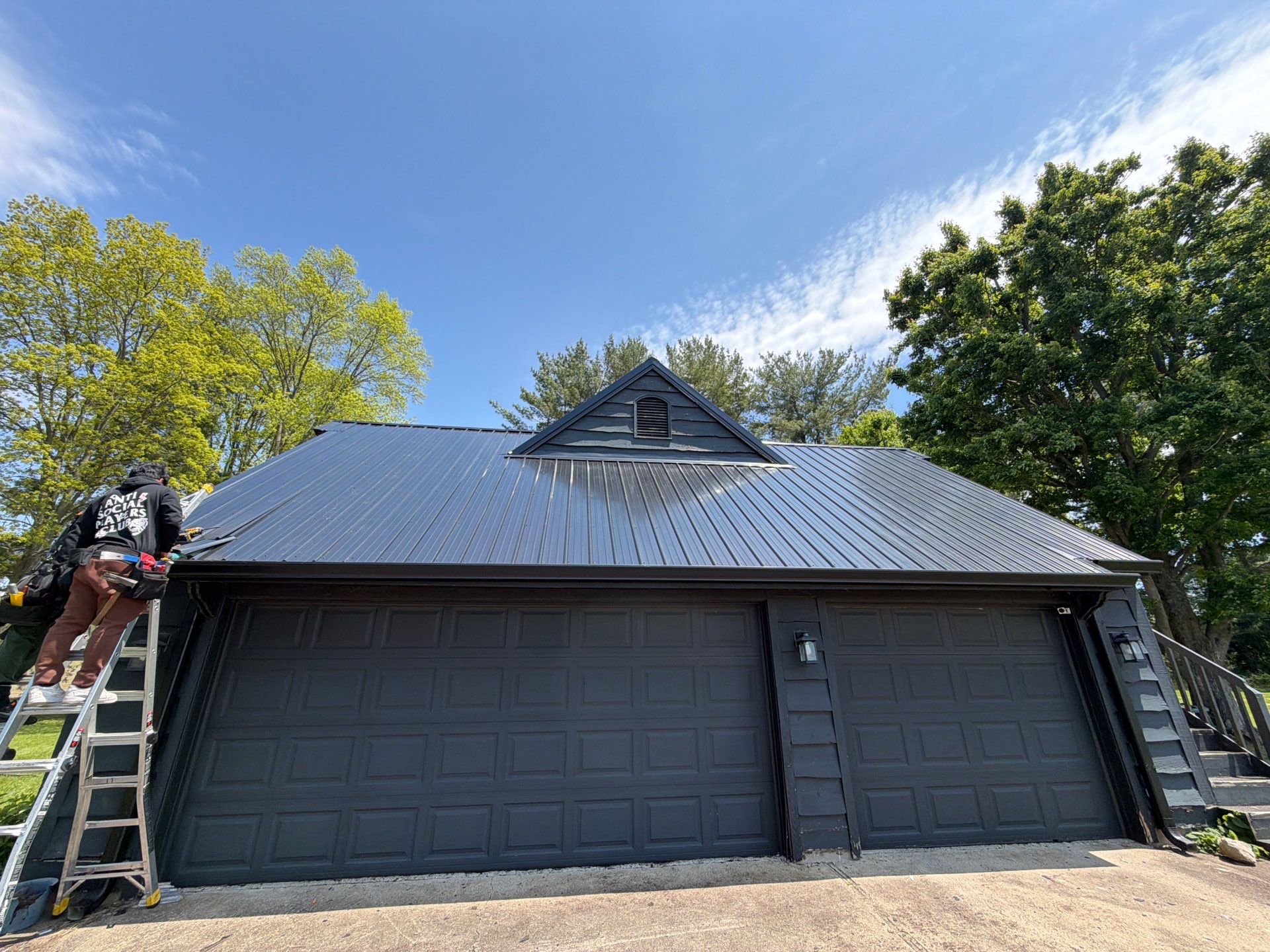 Classic Rib Metal Roofing - Shiny Black by Hoel Roofing & Remodeling