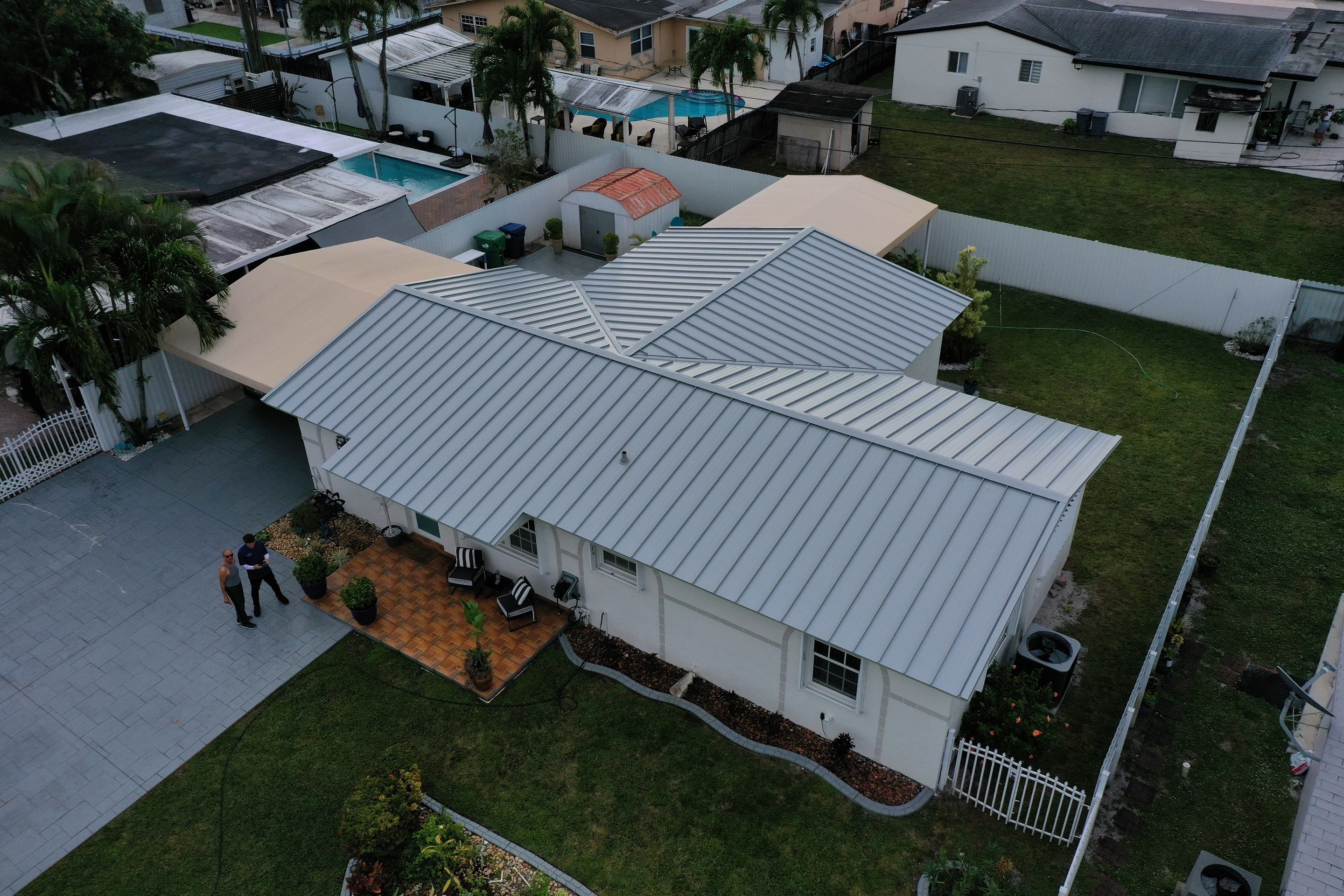 RESIDENTAL METAL REROOF 24 GUAGE DOVE GRAY 1-1/2" MECHANICAL SEAM METAL POLYGLASS POLYSTICK XFR by Earl W. Johnston Roofing LLC