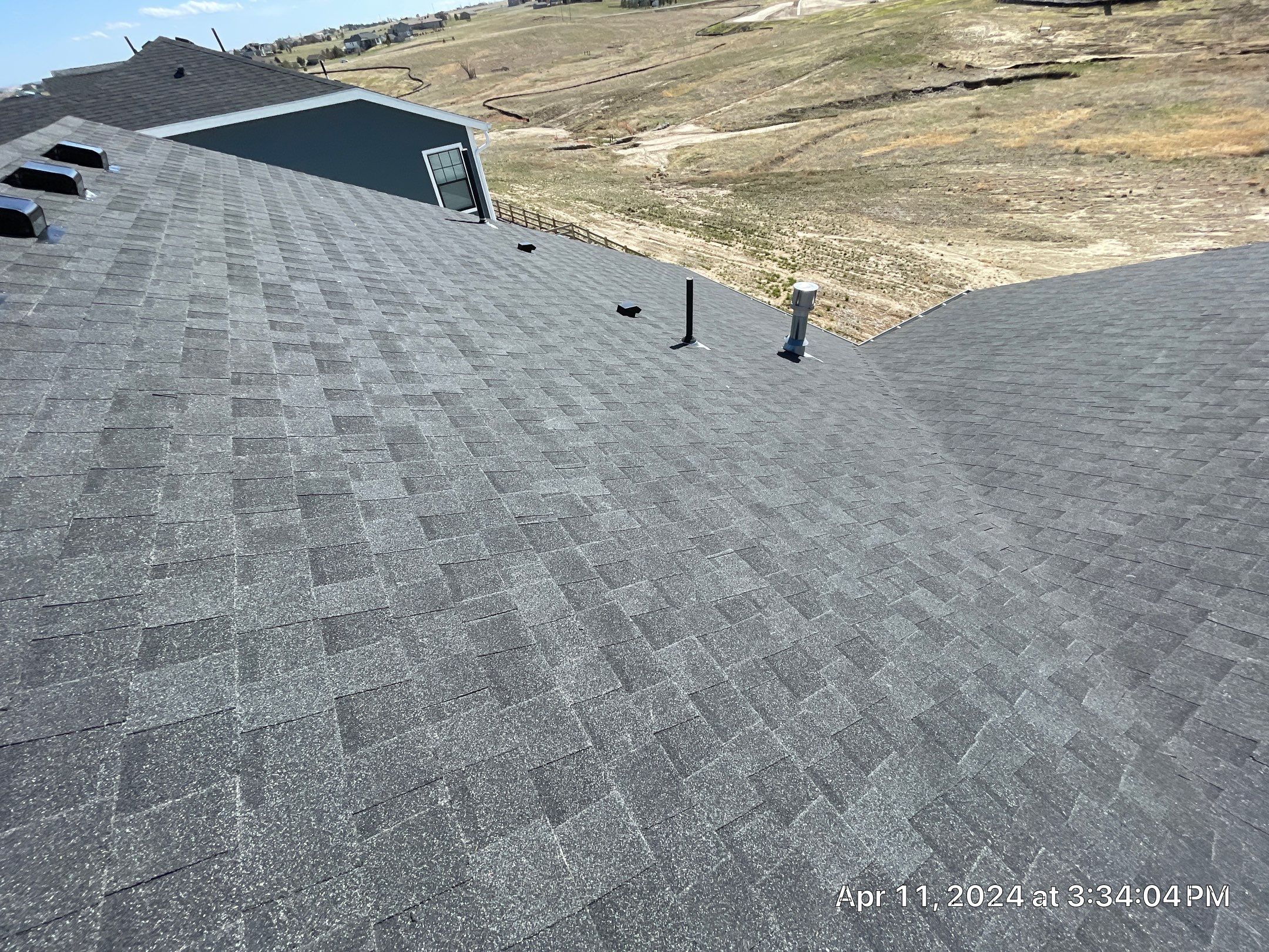 Residential Roofing Installation using Atlas Pinnacle Impact Black Shadow by Blue Peaks Roofing LLC 
