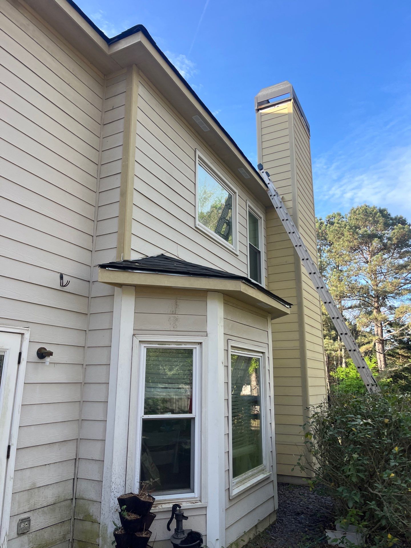 Marietta, GA Chimney Siding, Fascia, and Soffit Replacement using James Hardie Lap Siding, Hardie Trim, and Hardie Panel by Nelson Exteriors 