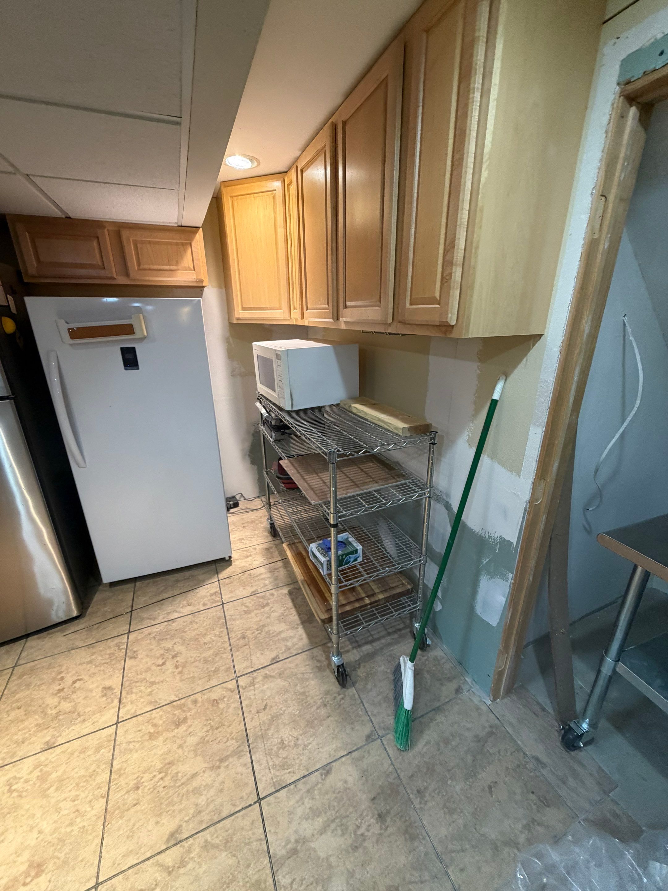 Basement Kitchen Renovation and Interior Wall Finishing in Brookfield by OCS Contracting Services